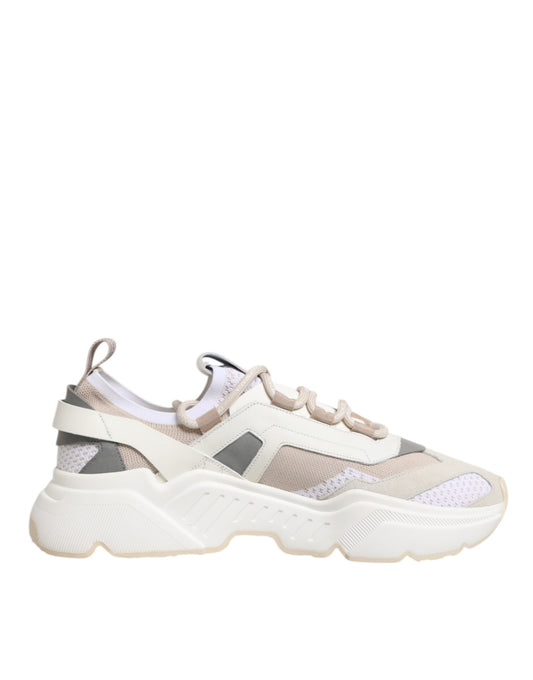 A pair of multicolored sneakers with laces and a low top design, featuring the brand name on the side