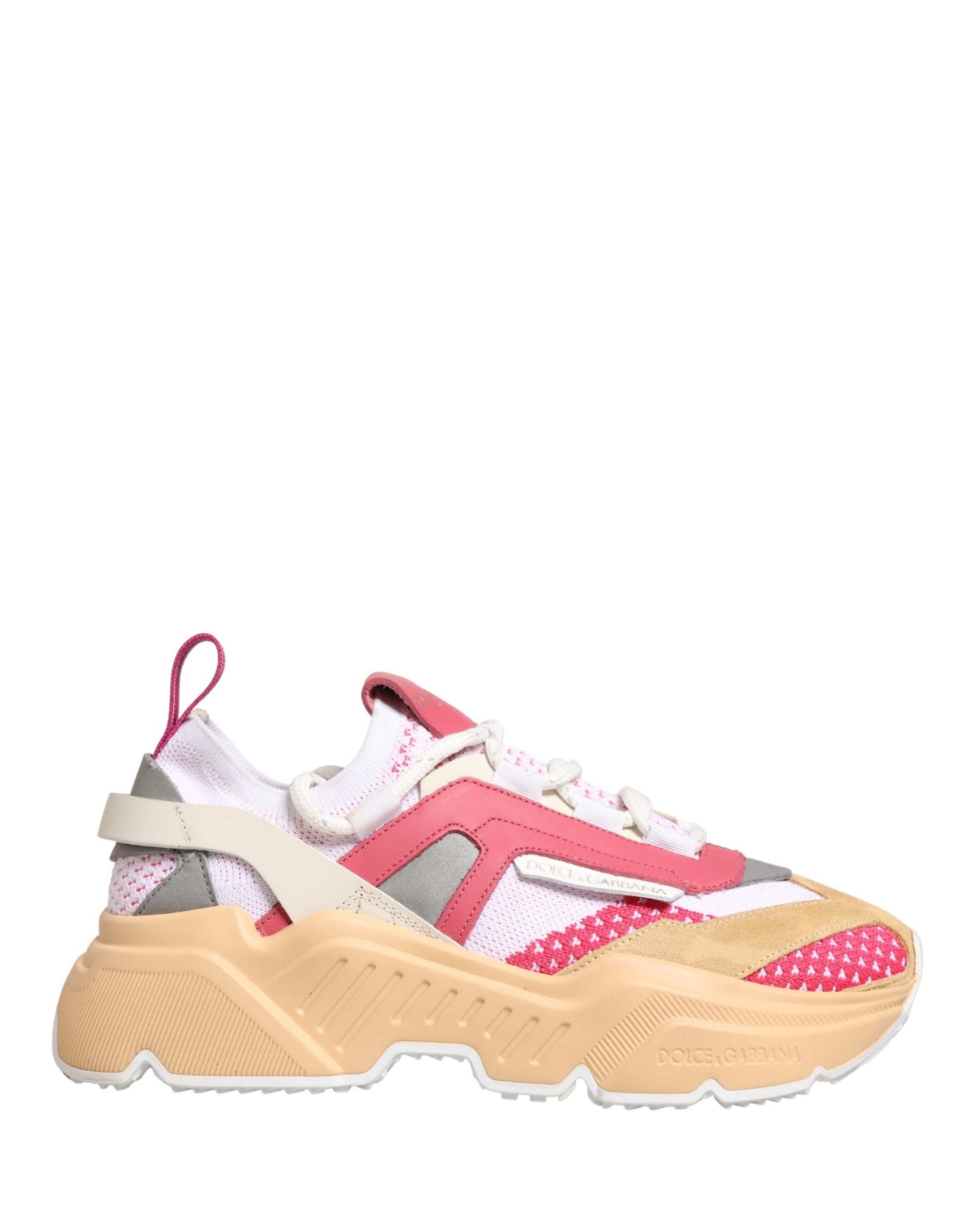 Pink and white sneakers with red accents, featuring a low top design