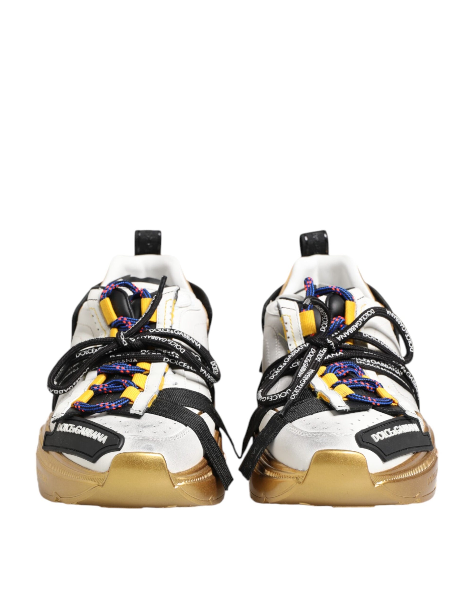 Pair of sneakers with gold accents