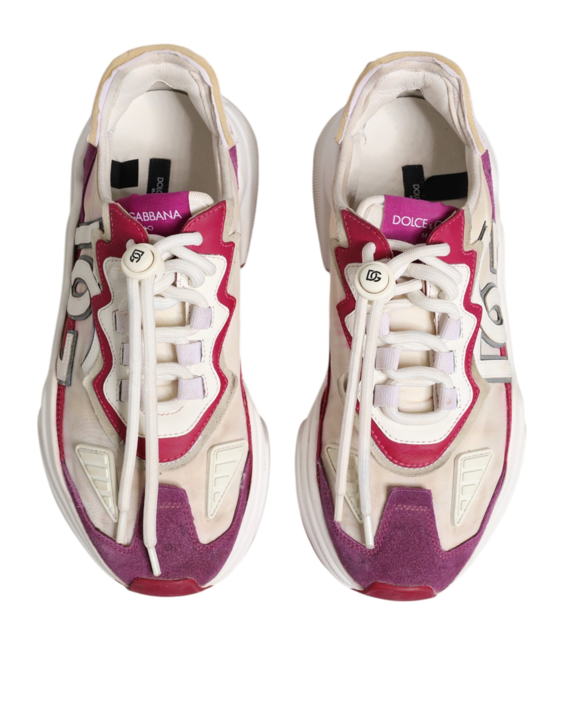 Pair of multicolored sneakers with laces and brand logo on side