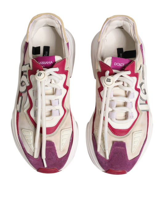 Pair of multicolored sneakers with laces and brand logo on side