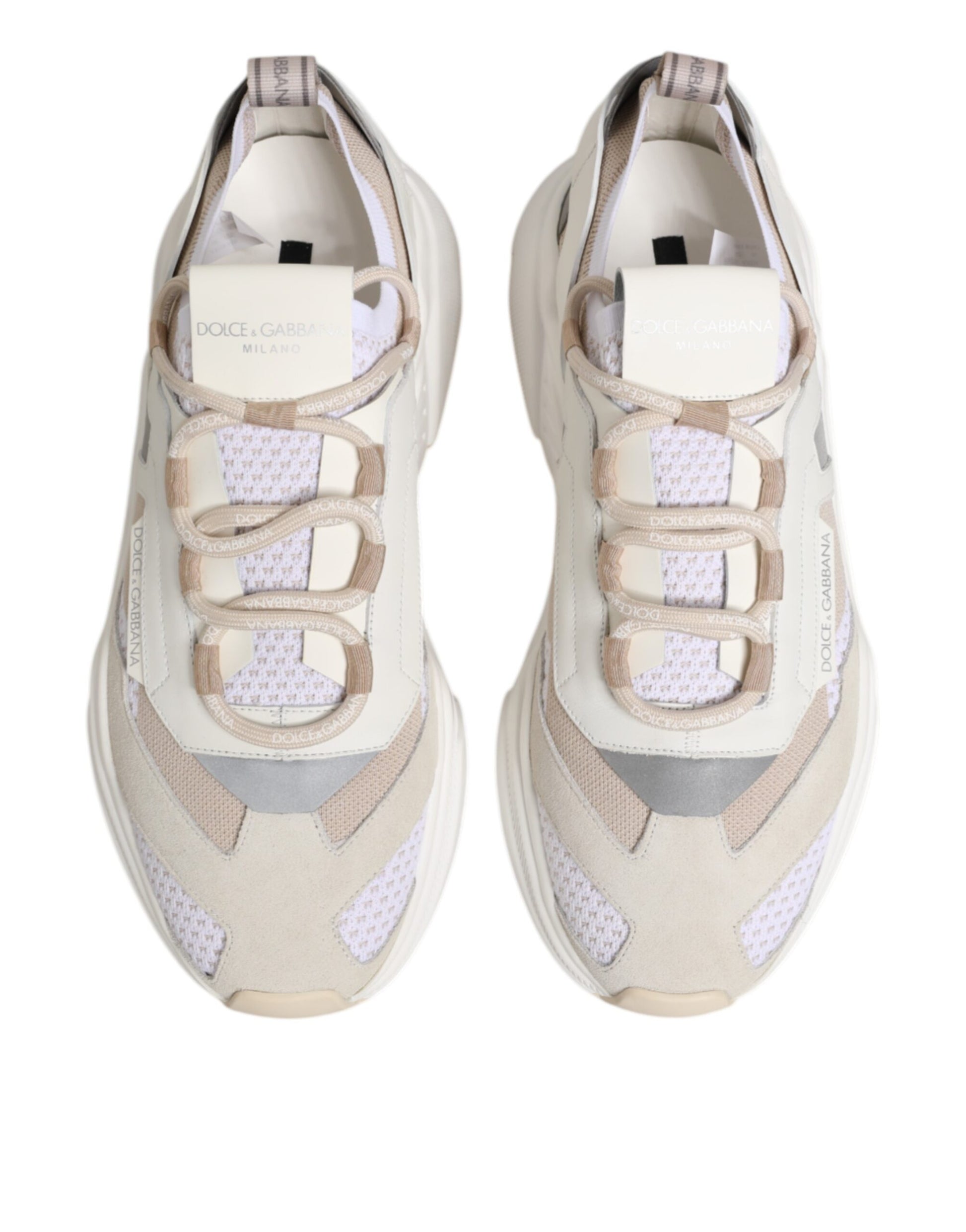 Pair of multicolored sneakers with laces and logo tag on tongue
