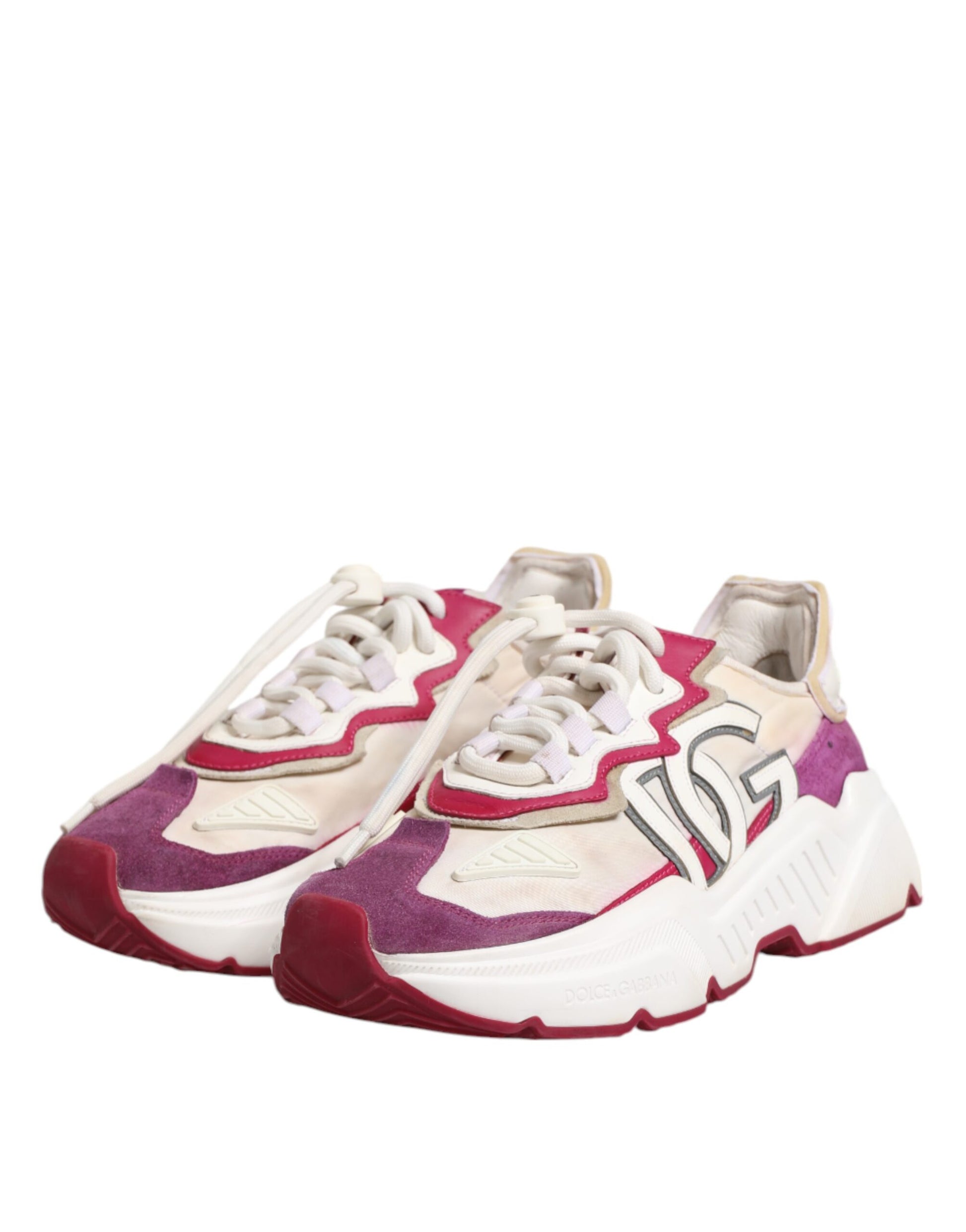 Pair of multicolored sneakers with white laces and a logo on the side