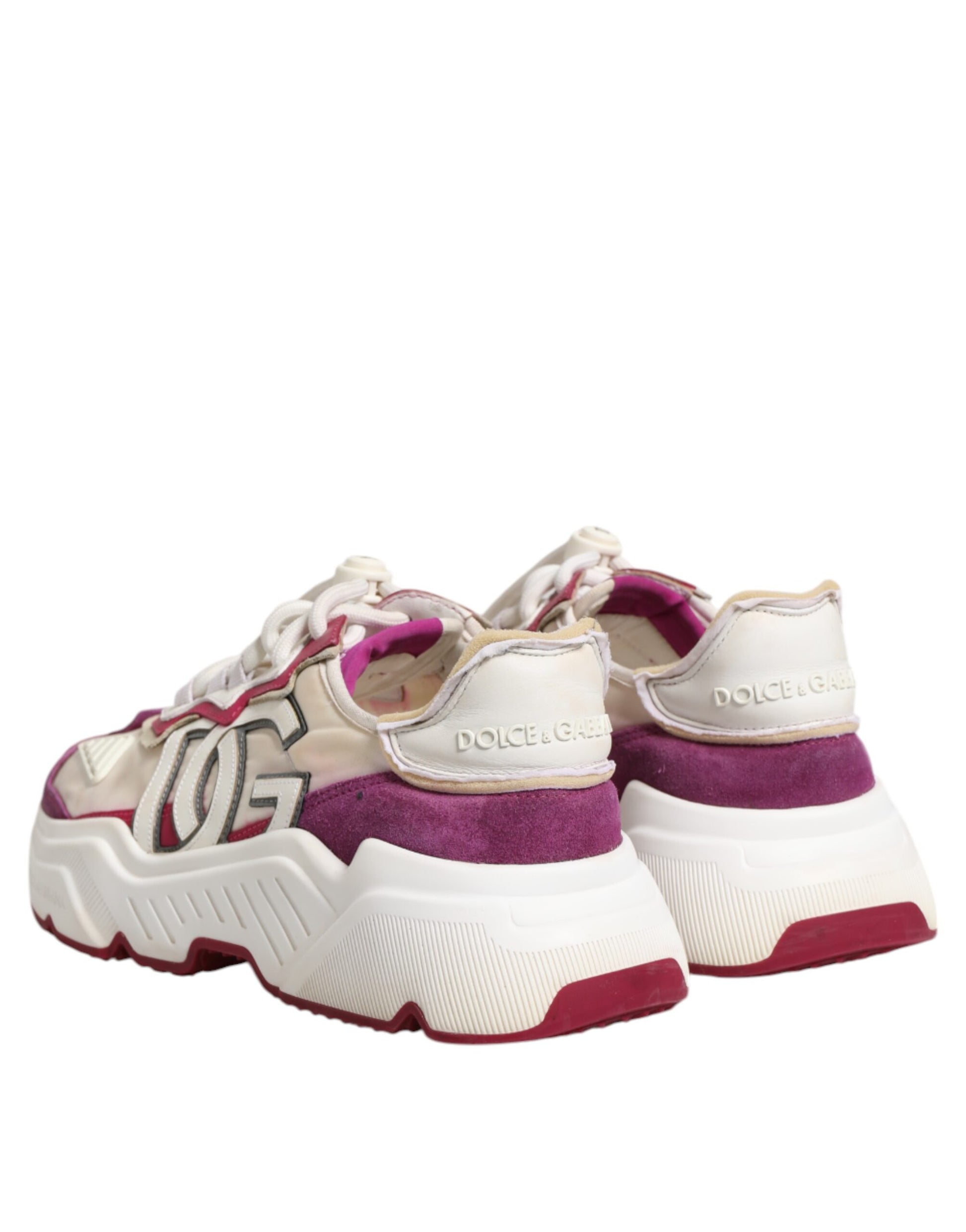 Pair of multicolored sneakers with laces and logo on side