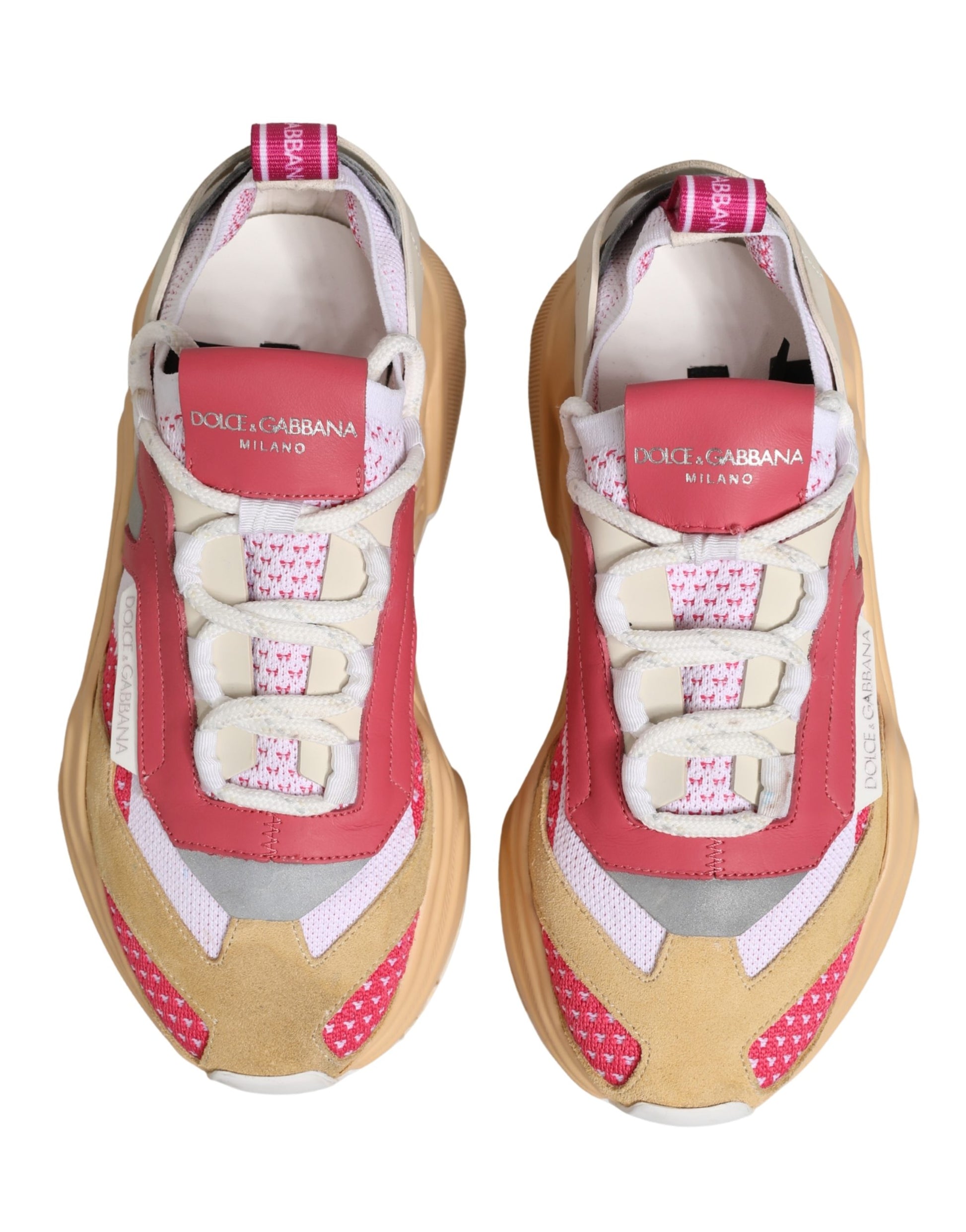 Pair of multicolored sneakers with red and white laces, branded logo on side