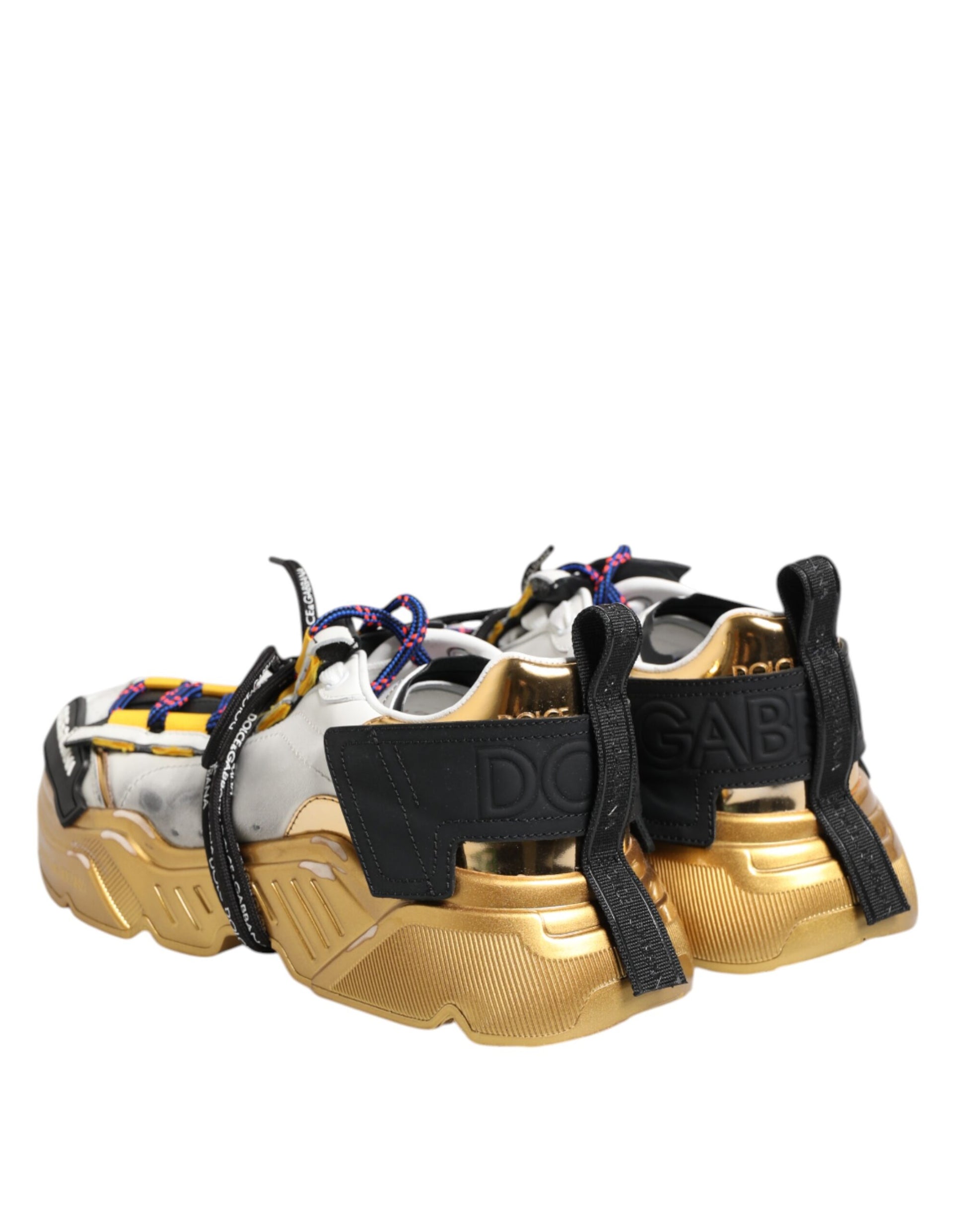 Gold shoes with black straps