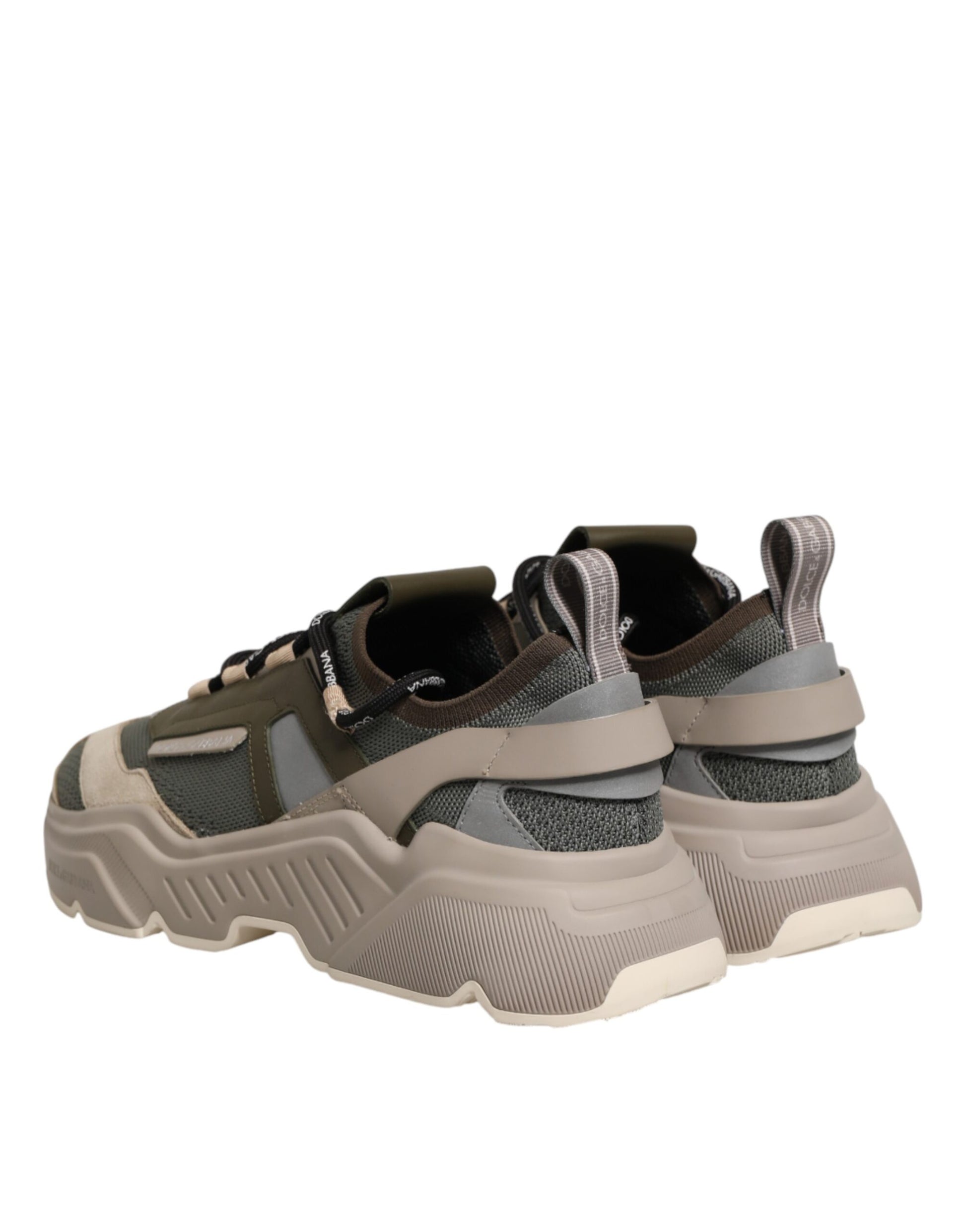 Athletic shoe with laces and a strap over the top for support
