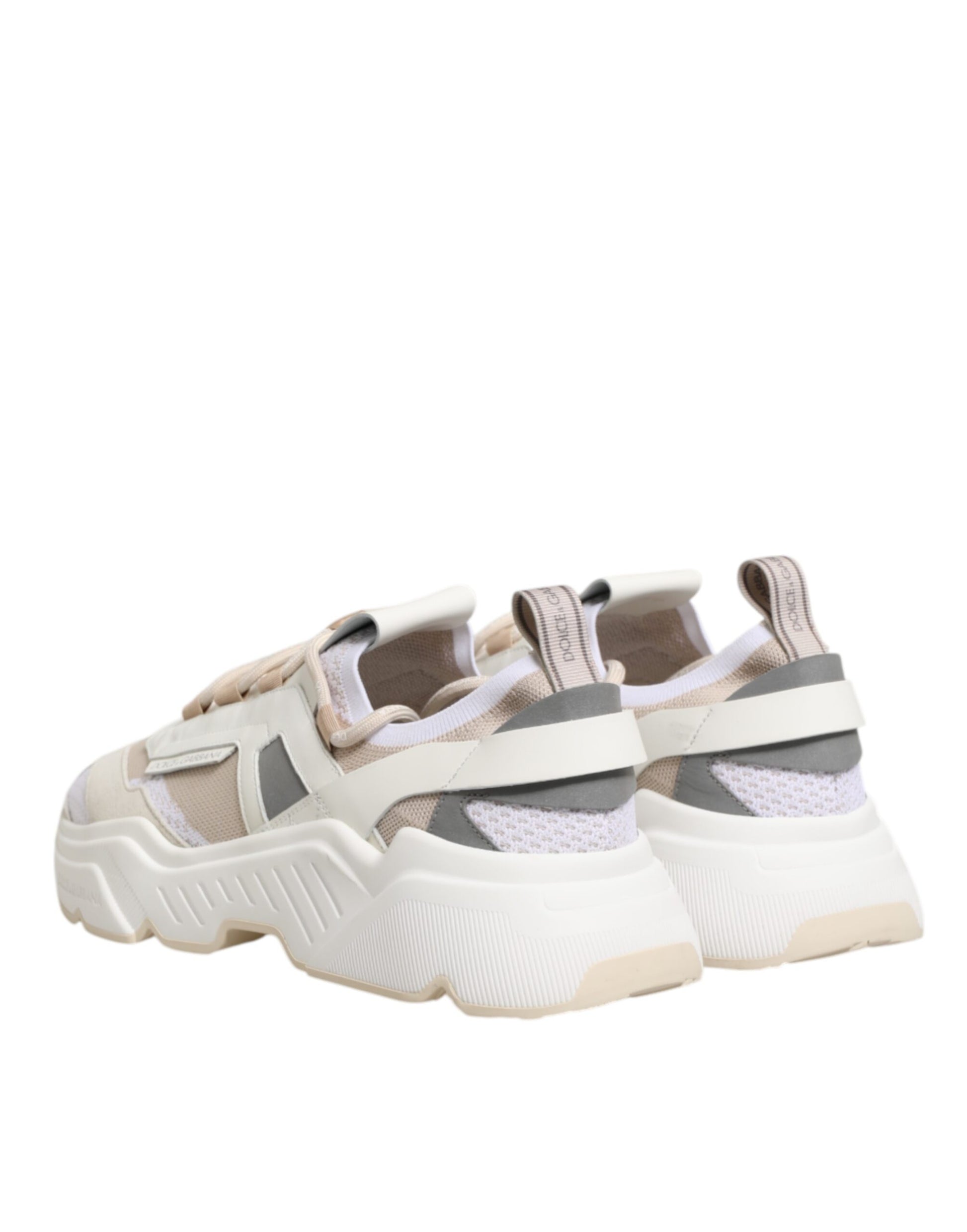 Pair of multicolored sneakers with laces, featuring a low top design and a chunky sole