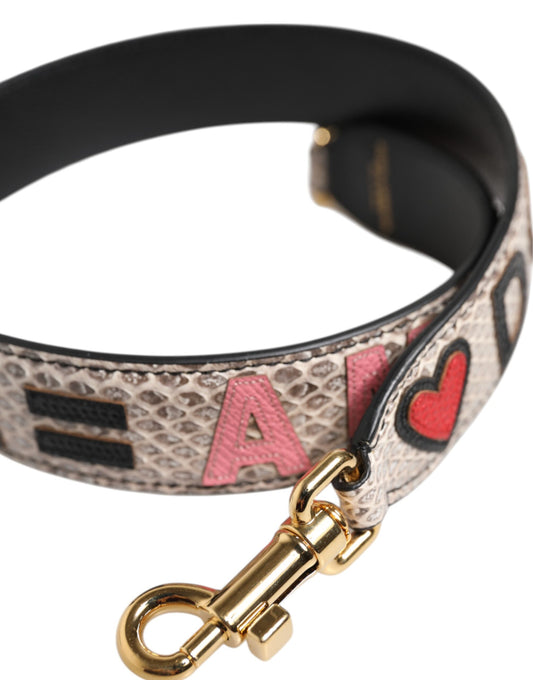 Black leather dog collar with gold buckle and heart design