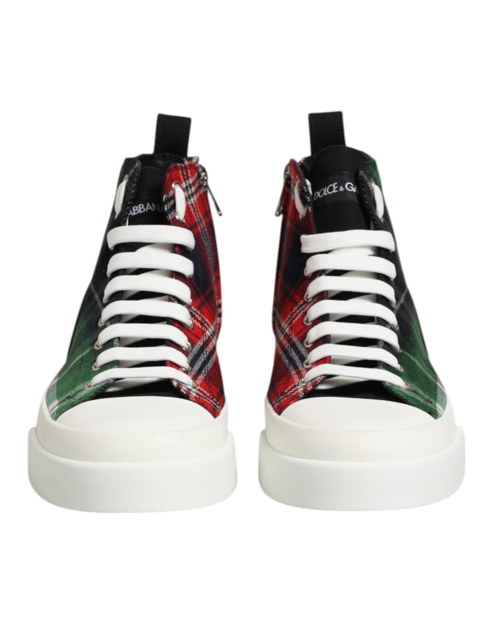 Pair of high top sneakers with laces and a plaid pattern on the side