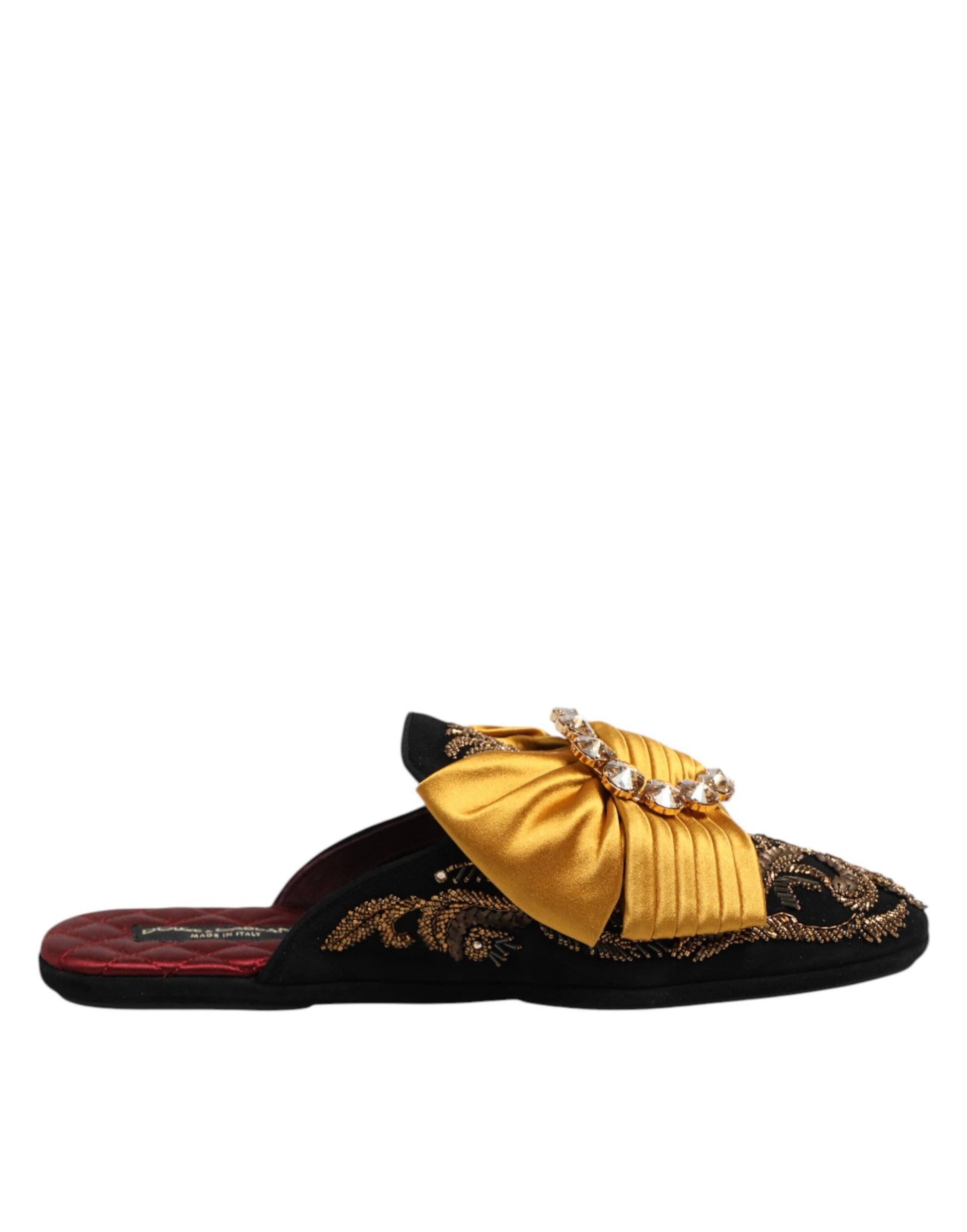 Pair of women's embellished sandals with gold bow and sequins