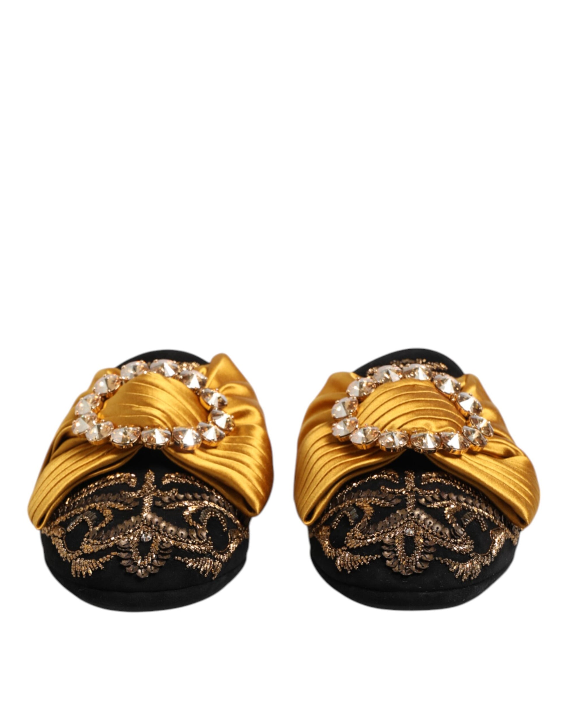 Pair of gold embroidered slippers with sequins on black fabric
