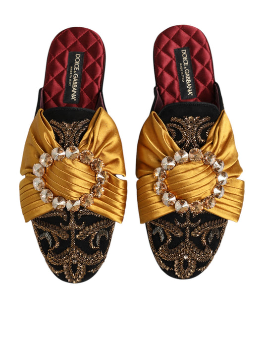 Pair of gold and black embroidered women's shoes with ruffled trim and beaded detailing