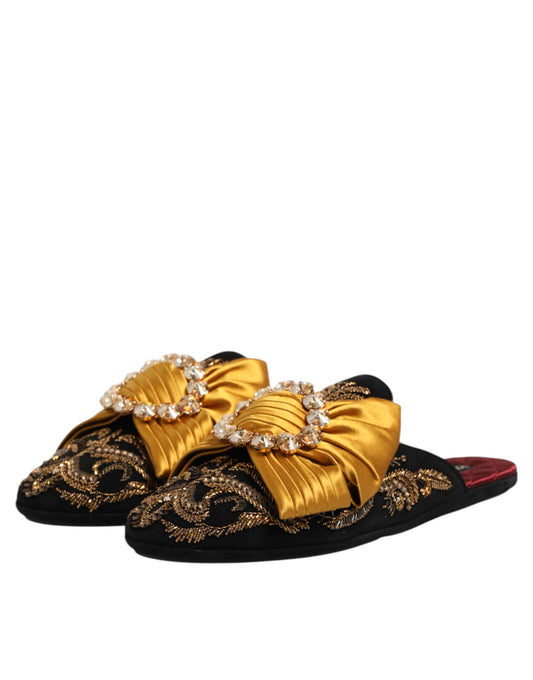 Pair of gold embroidered slippers with bow ties