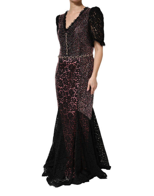 A long, black mermaid gown with pink and white embellishments