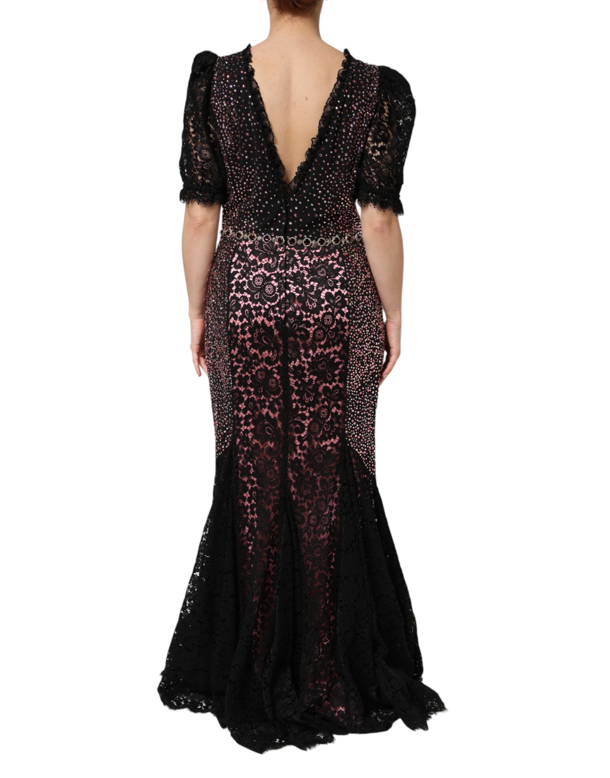 A long, multicolored dress with embellishments and a mermaid silhouette