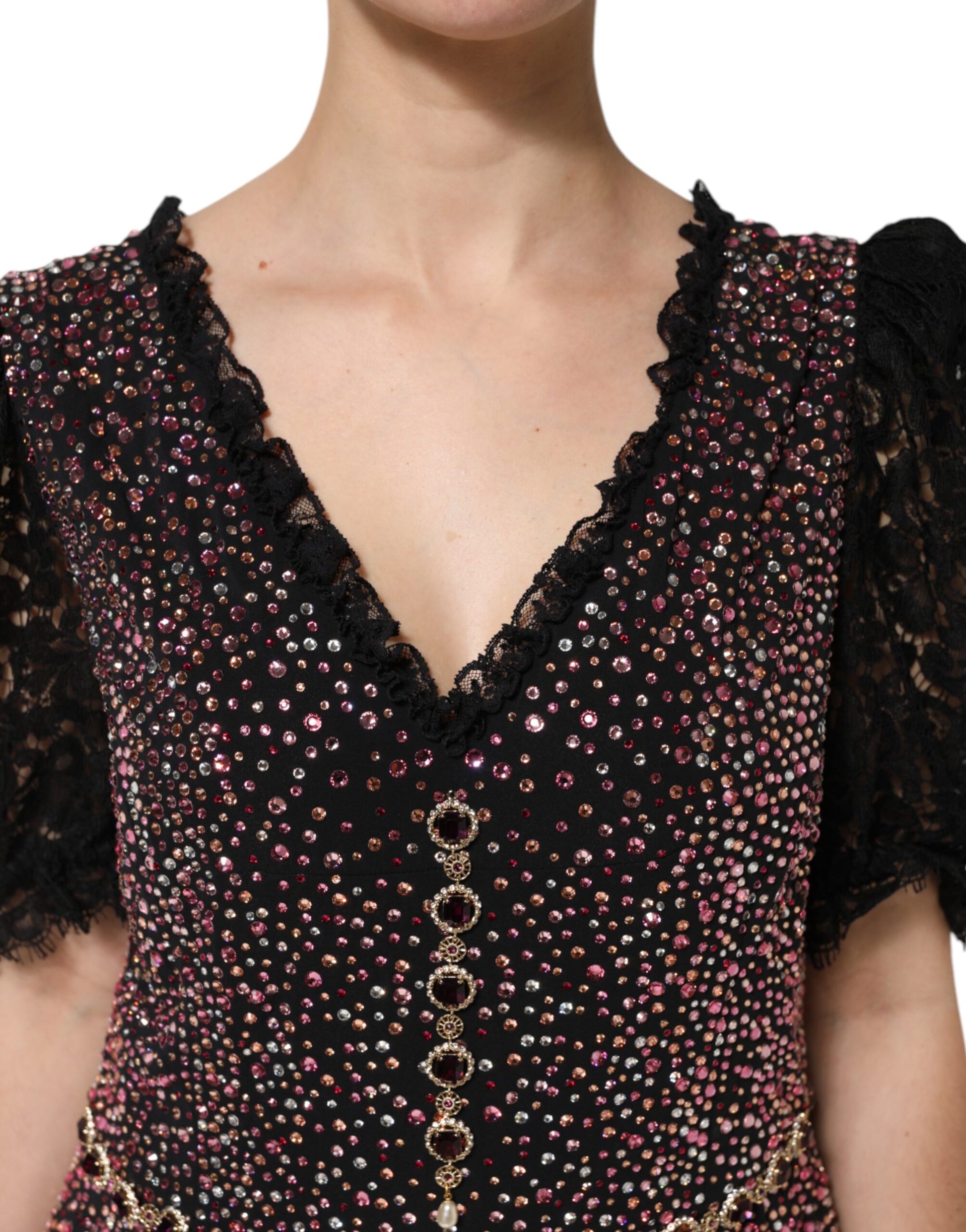Black dress with pink embellishments and gold accents, mermaid silhouette