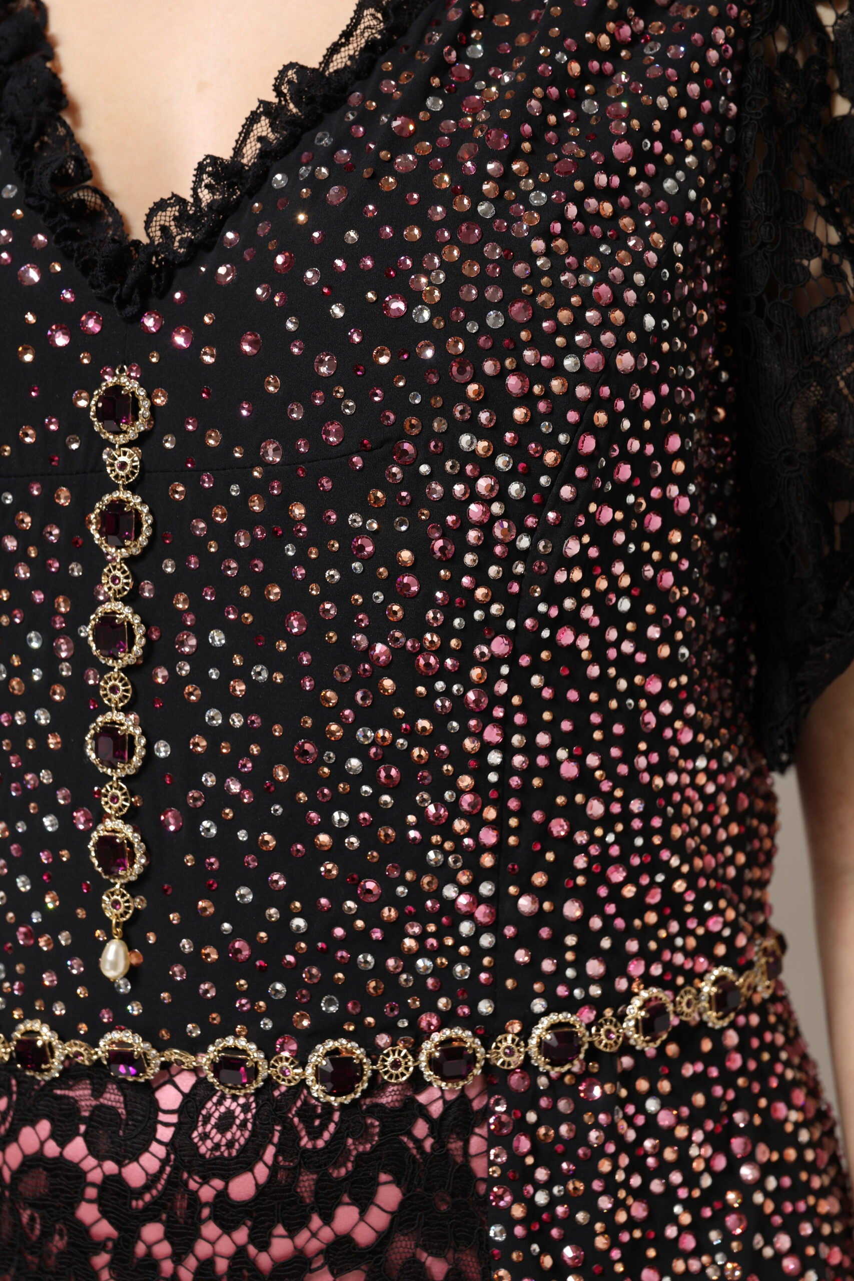 Black dress with pink and gold sequins, mermaid silhouette, strapless neckline