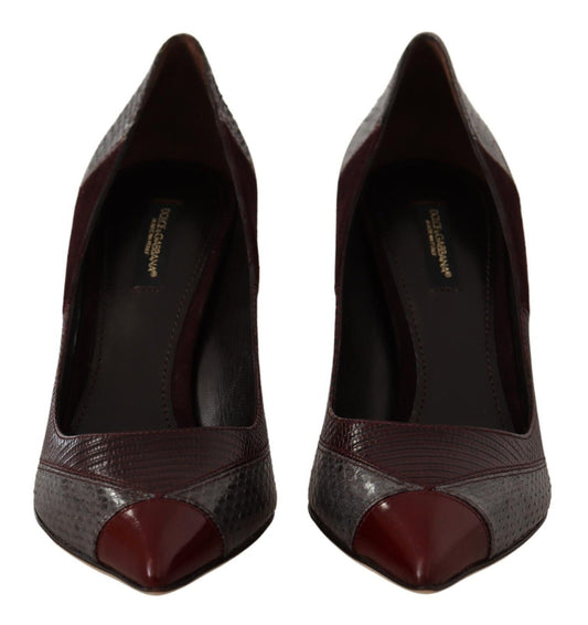 Pair of women's dress shoes with pointed toe and embossed texture on vamp
