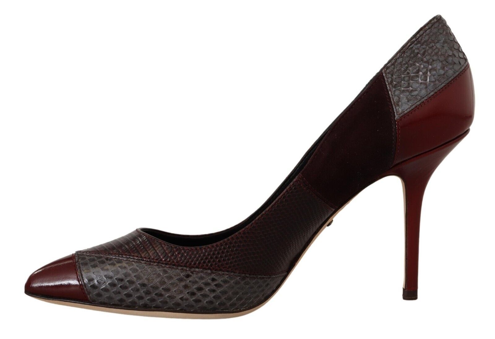 Brown high heel shoe with a pointed toe and a stiletto heel