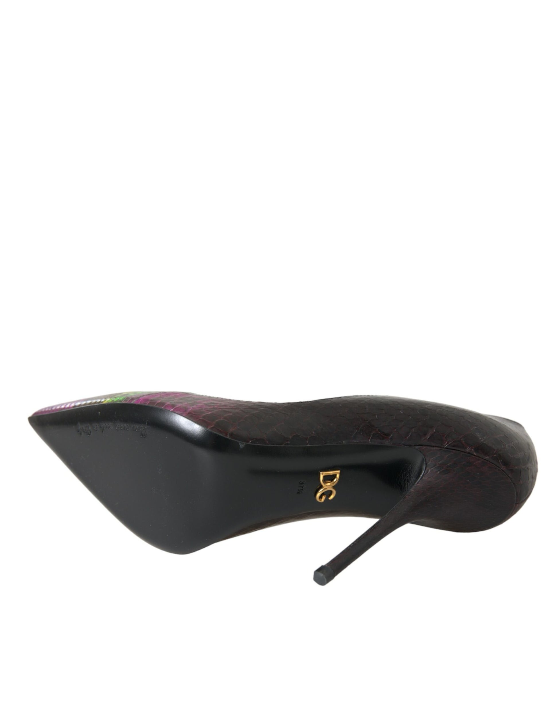 Black leather bike seat with gold accents
