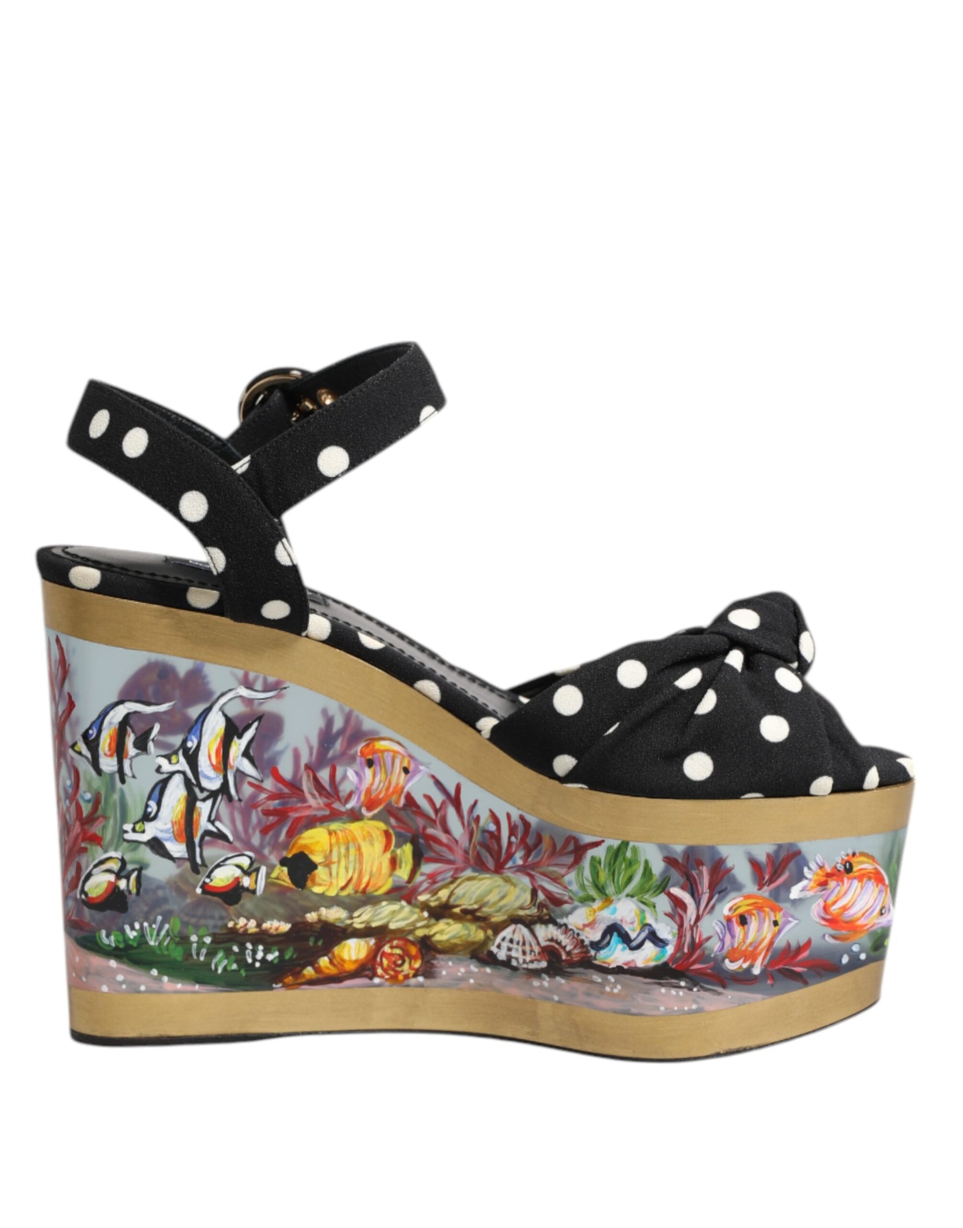 Black shoe with polka dots and a fish design on the sole