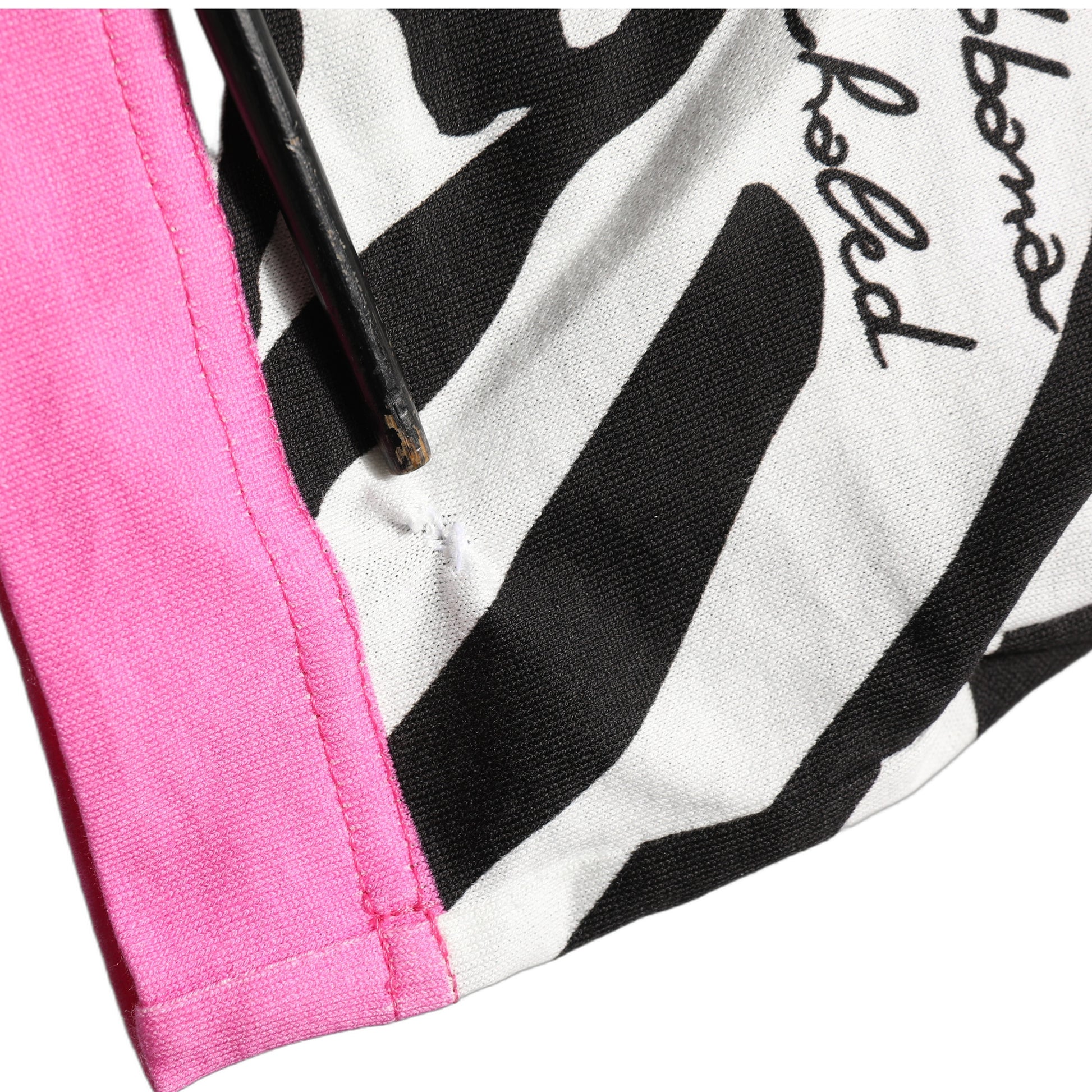 Pink, white, and black zebra striped trim t-shirt