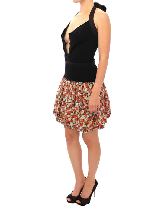 Woman wearing a black tank top and floral skirt
