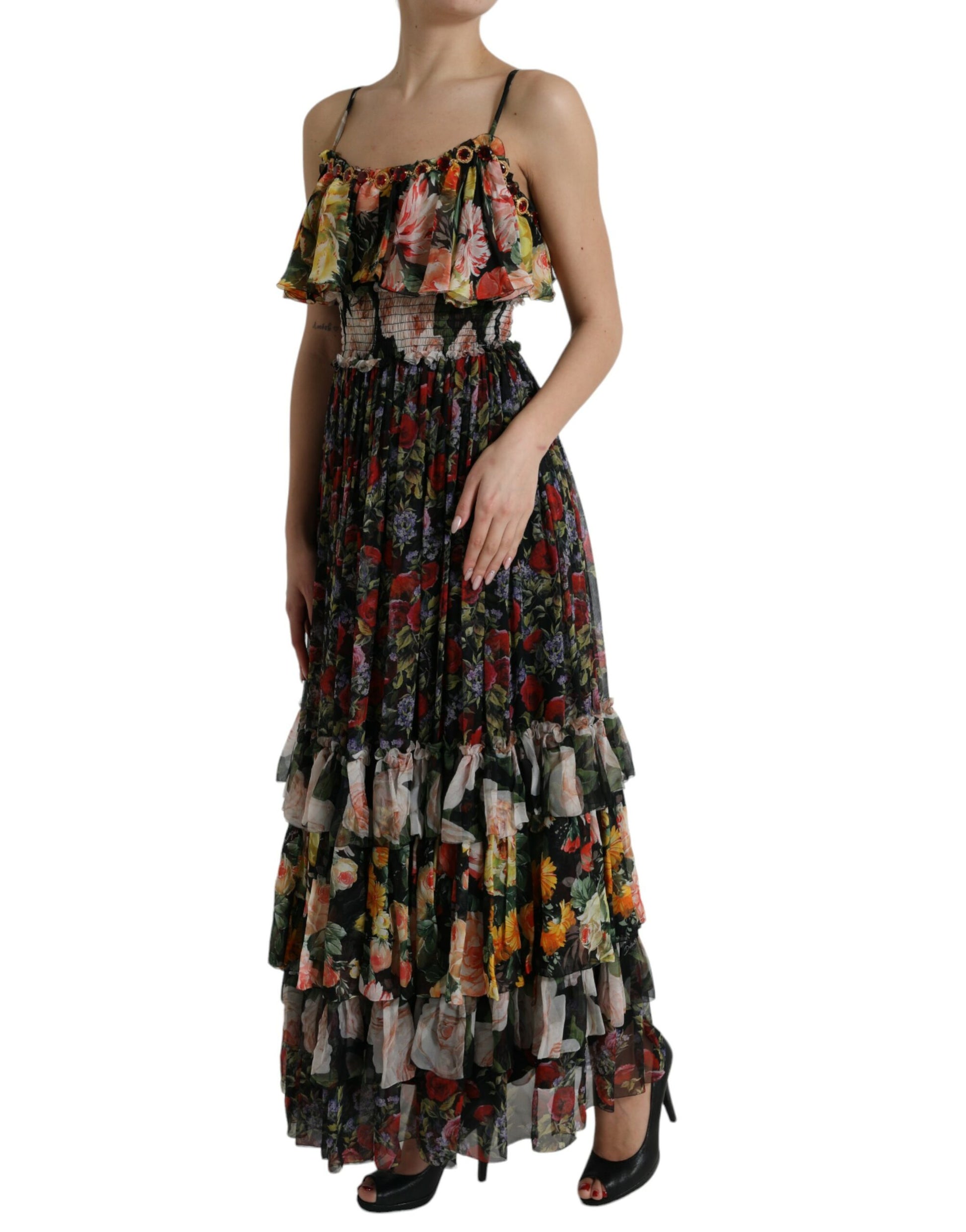 A long, tiered maxi dress with a floral pattern and chiffon fabric