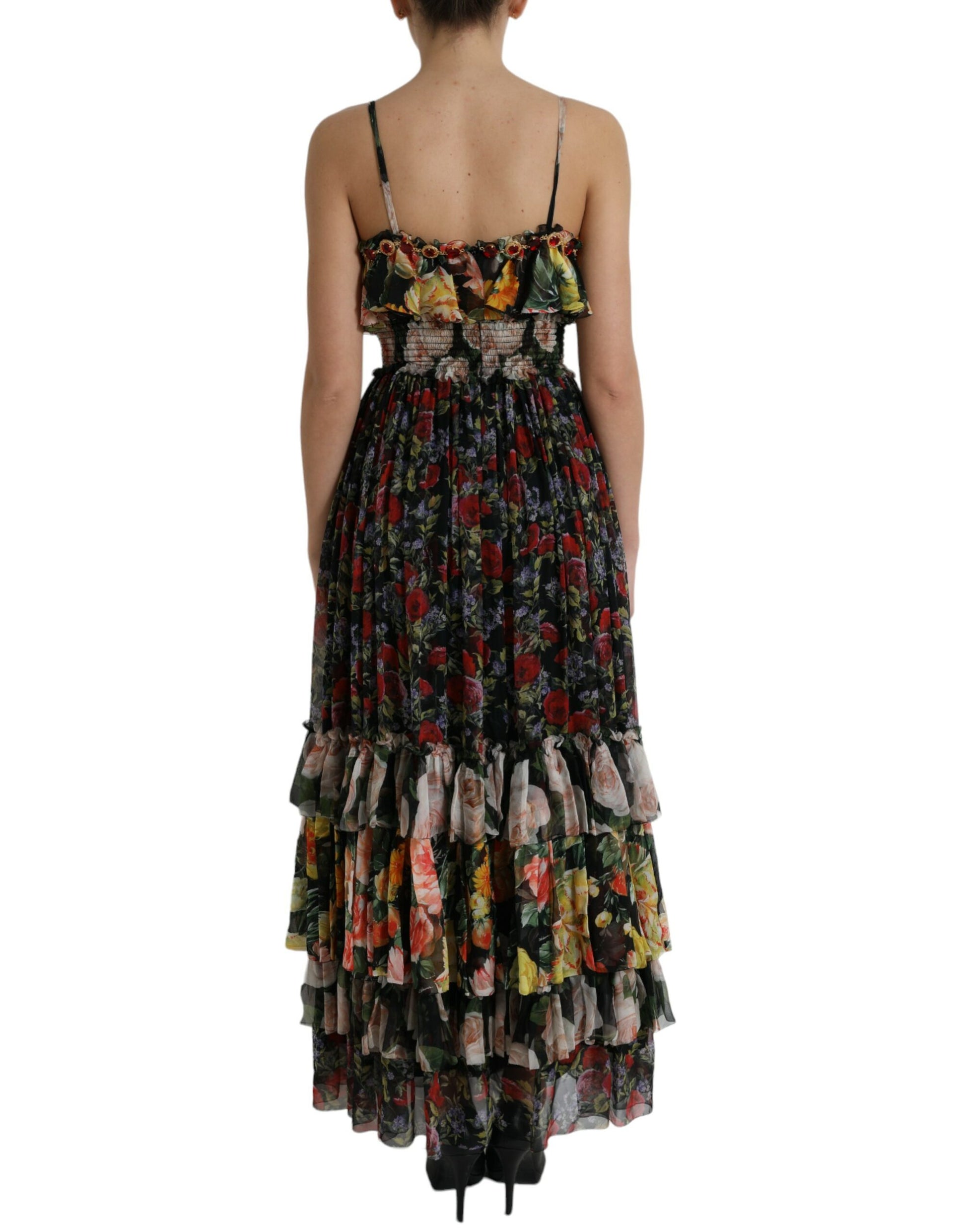 A long, tiered maxi dress with a floral pattern and chiffon fabric