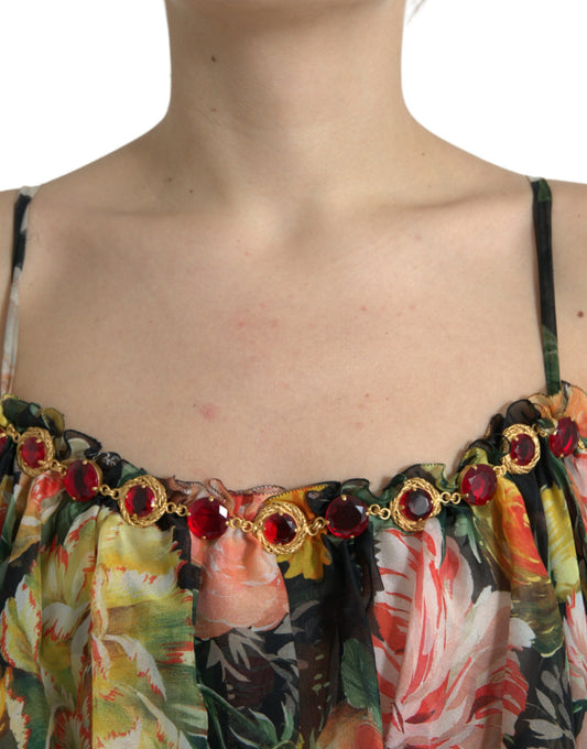 A woman wearing a multicolored floral chiffon tiered maxi dress