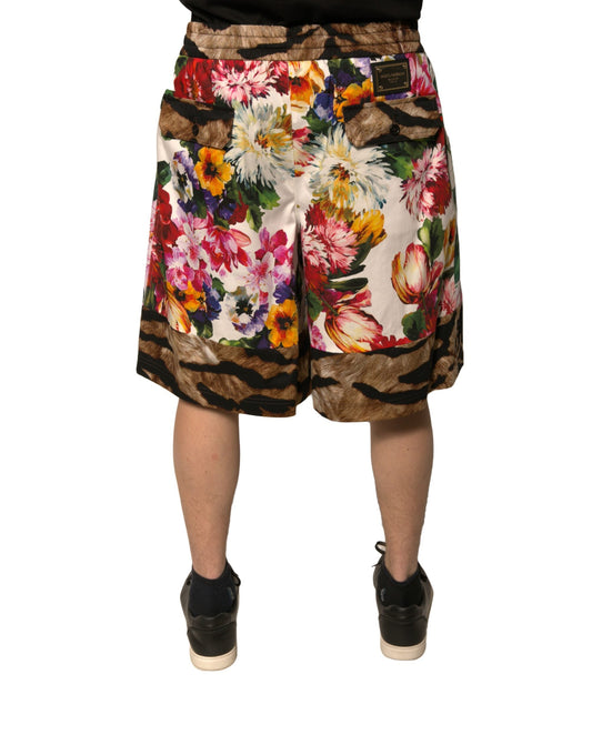 A pair of men's shorts with a floral pattern featuring various colors