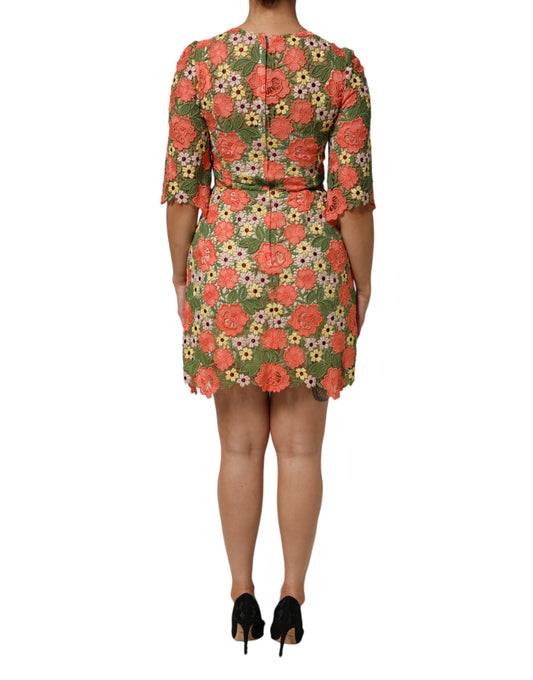 A floral embroidered mini dress with a fitted silhouette and short sleeves