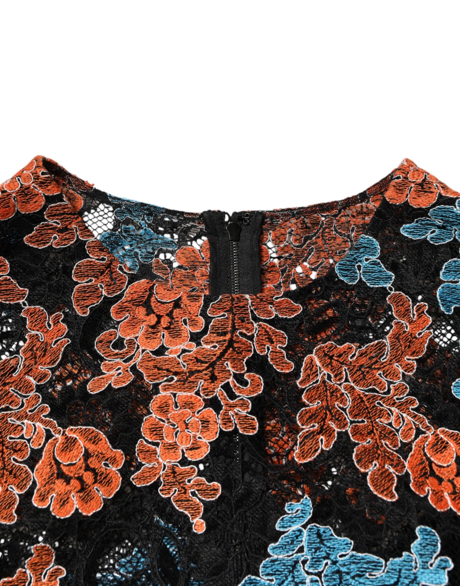 A colorful floral embroidered shift dress with a V-neckline