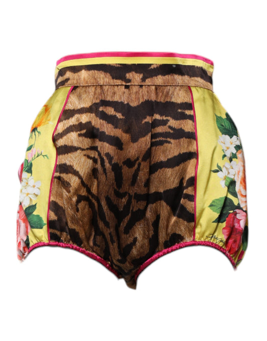 Pair of shorts with camouflage pattern and floral print on waistband