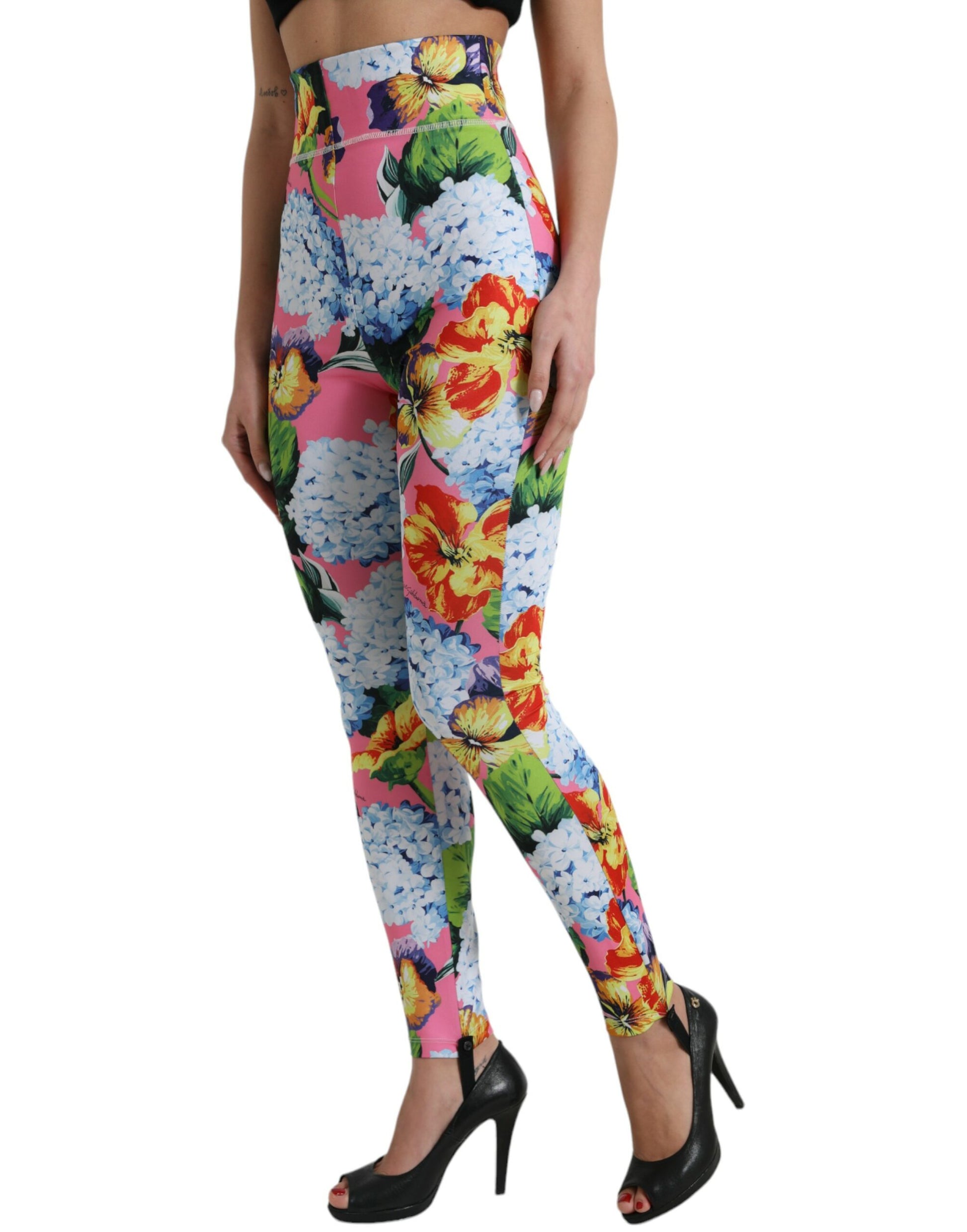 Woman wearing colorful leggings with floral pattern