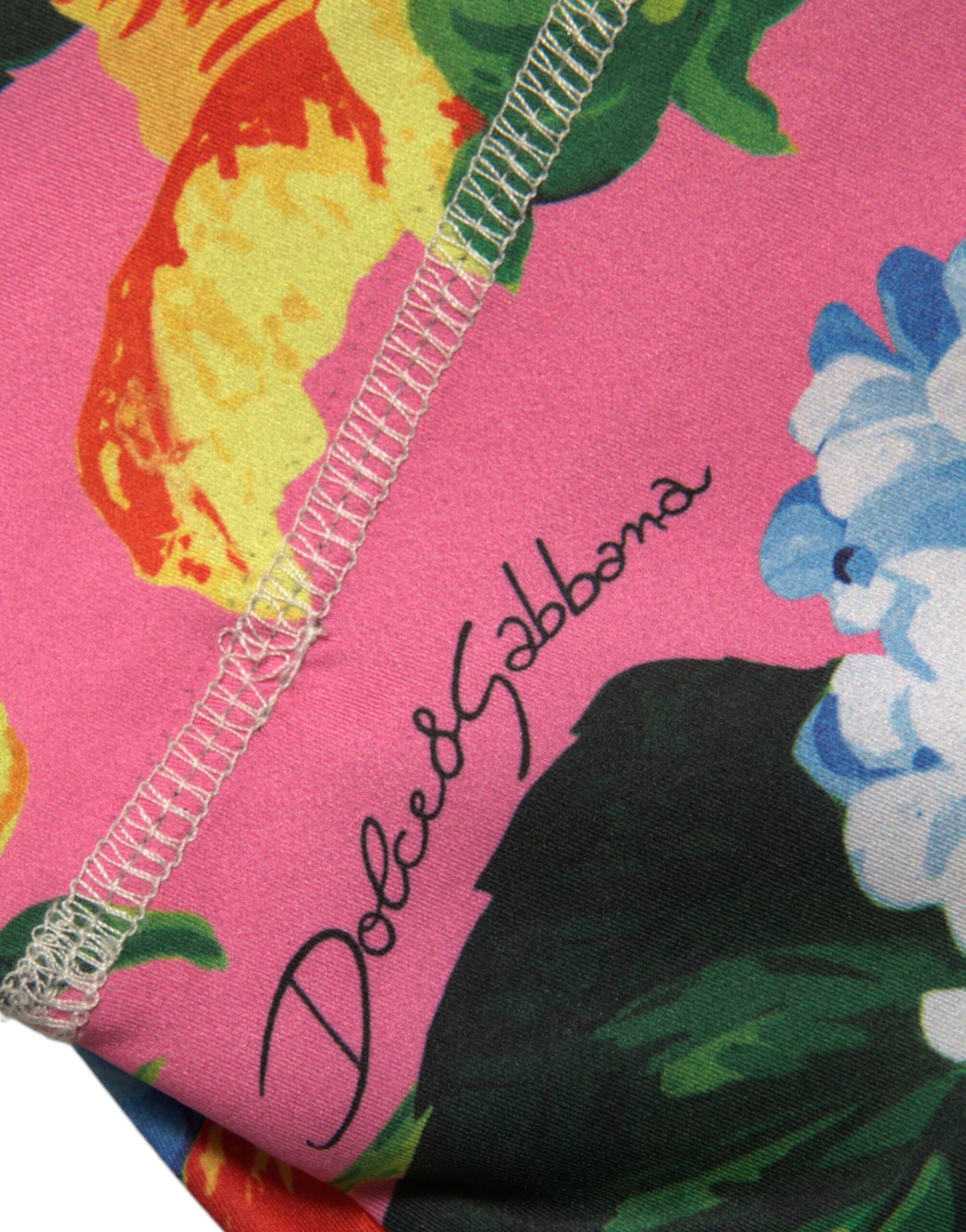 Pink floral fabric with black writing
