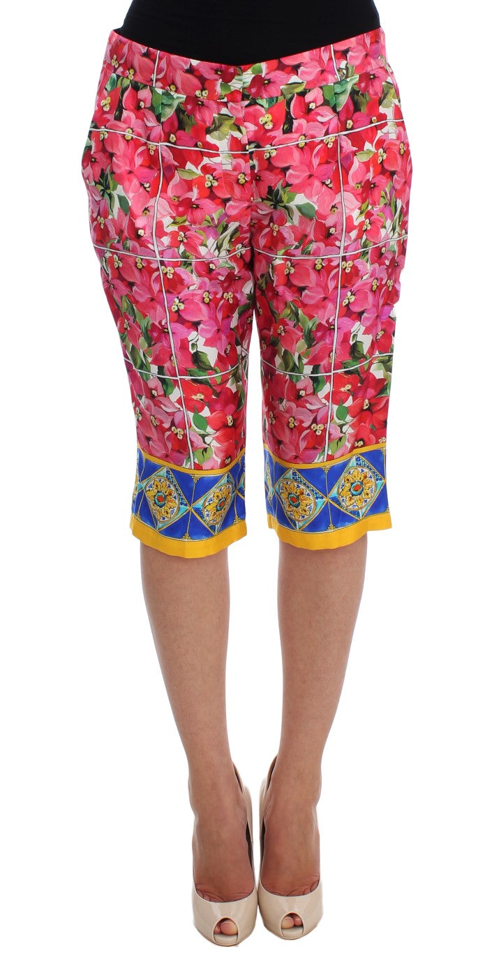 Pink floral patterned shorts with blue trim