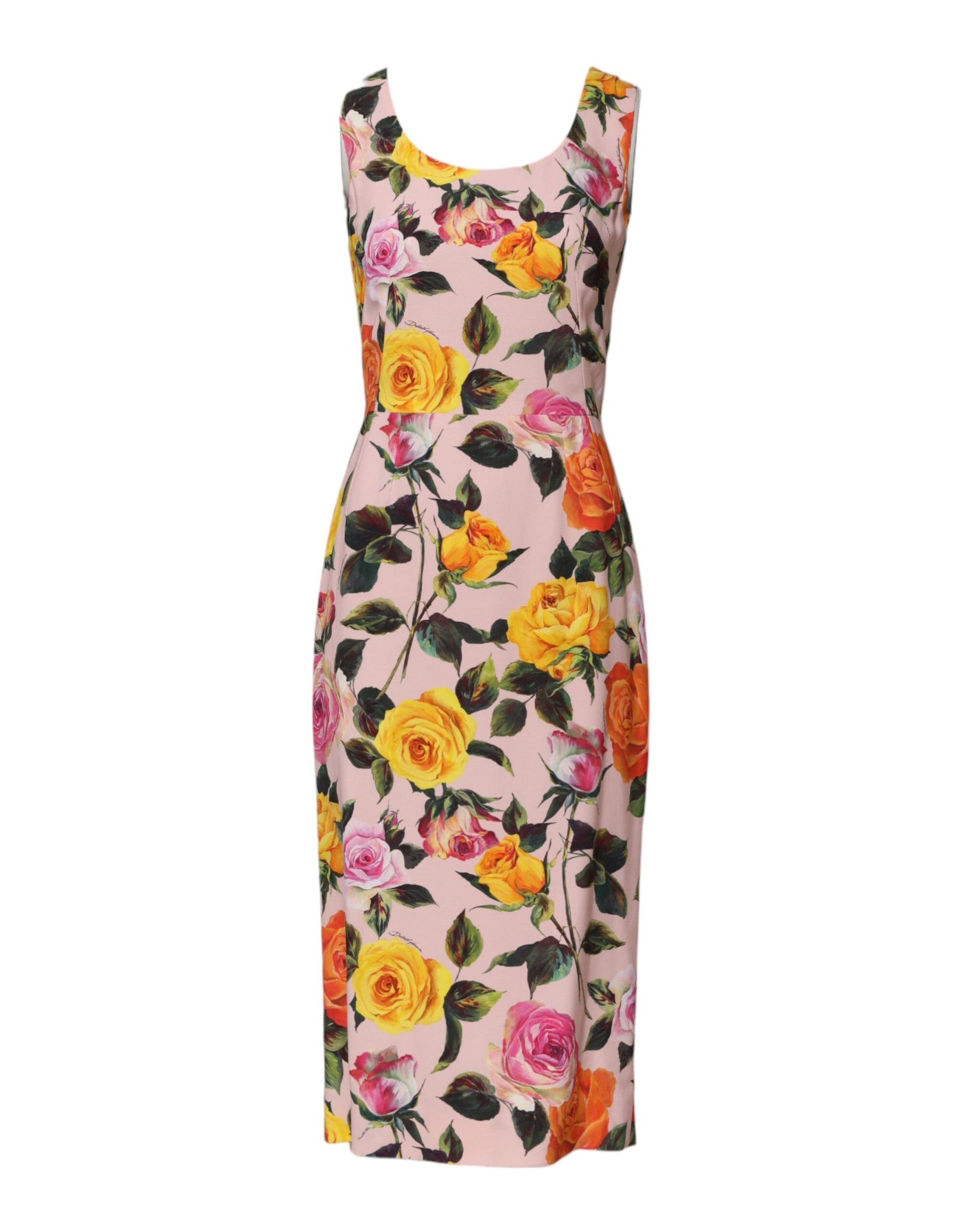 A knee length sheath dress with a floral print featuring pink, yellow and green flowers