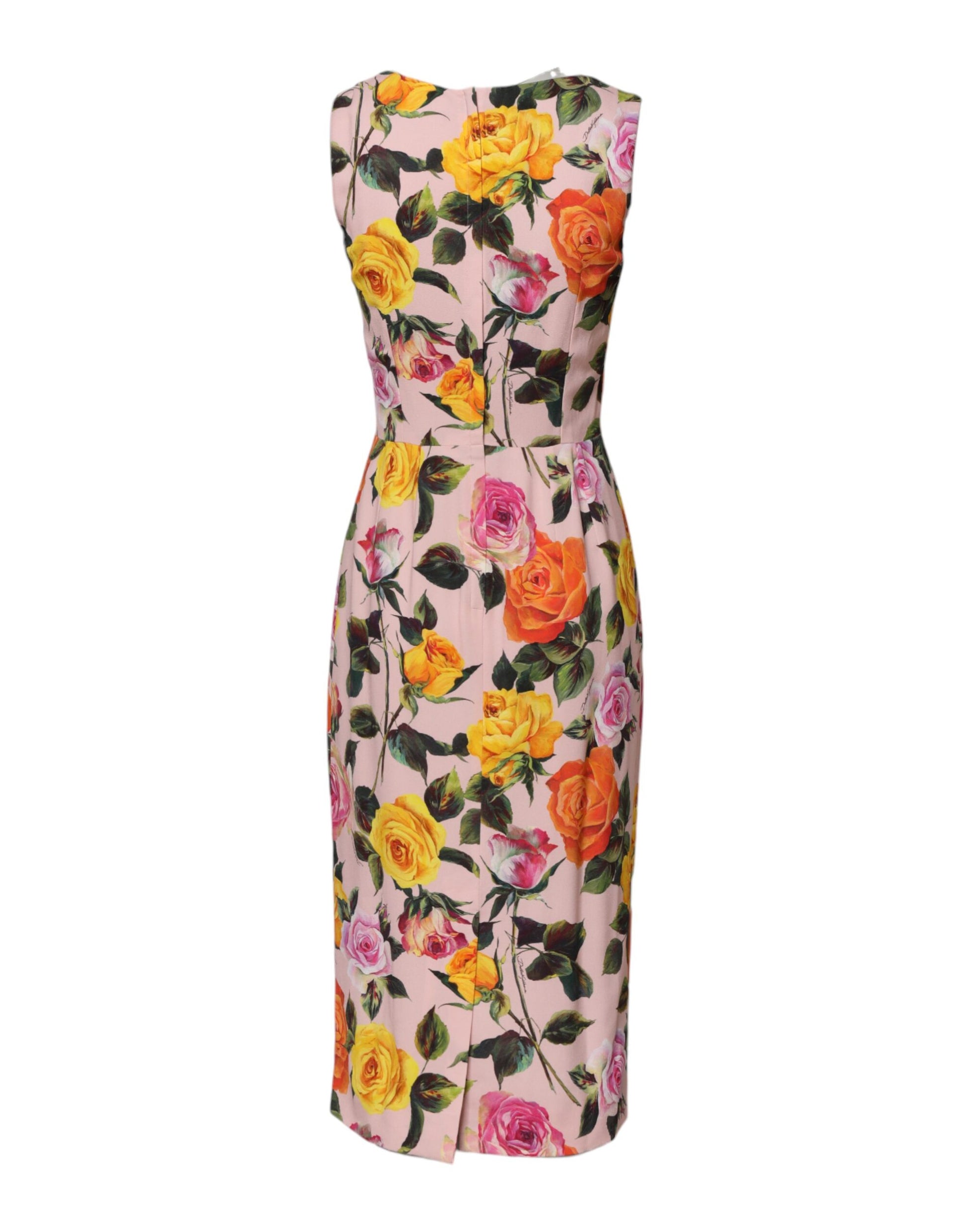 Pink floral knee length dress with multicolored flowers and green leaves