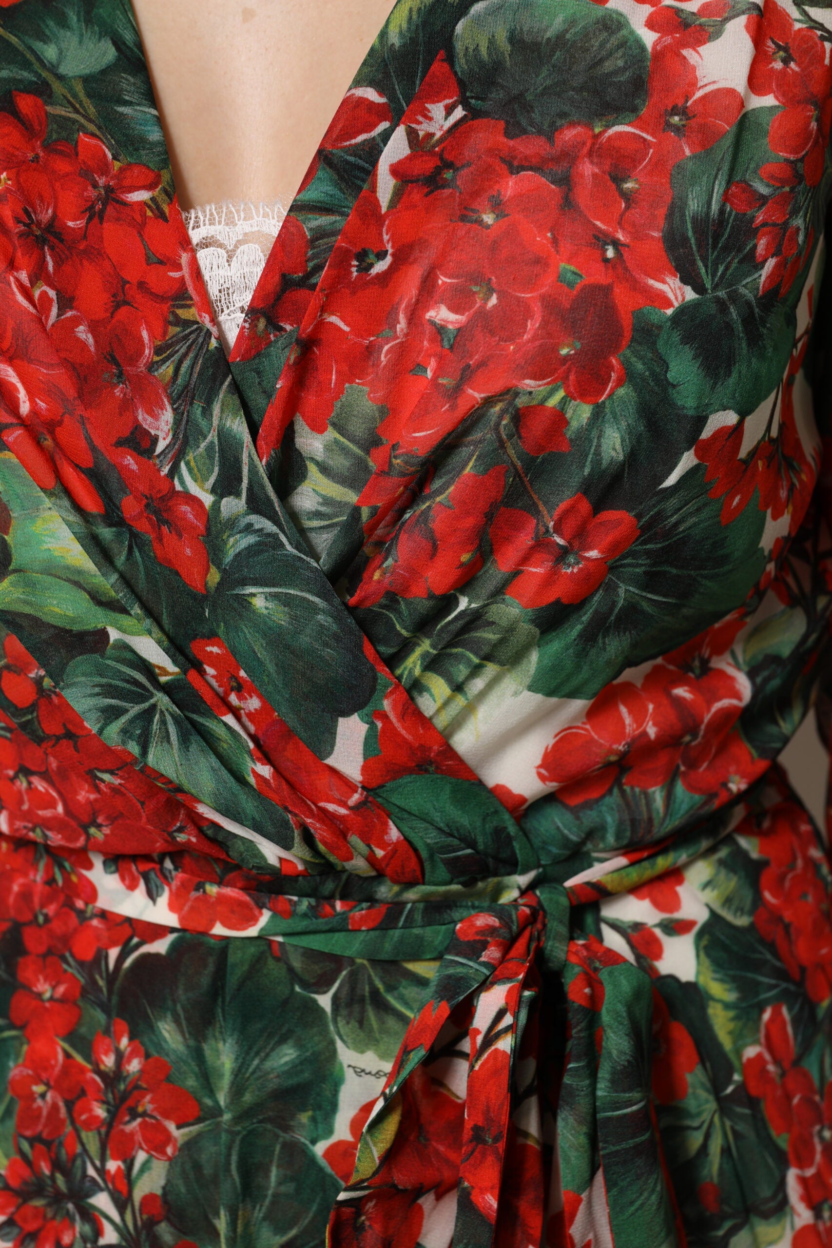 A long sleeve dress with a floral pattern and a V-neck