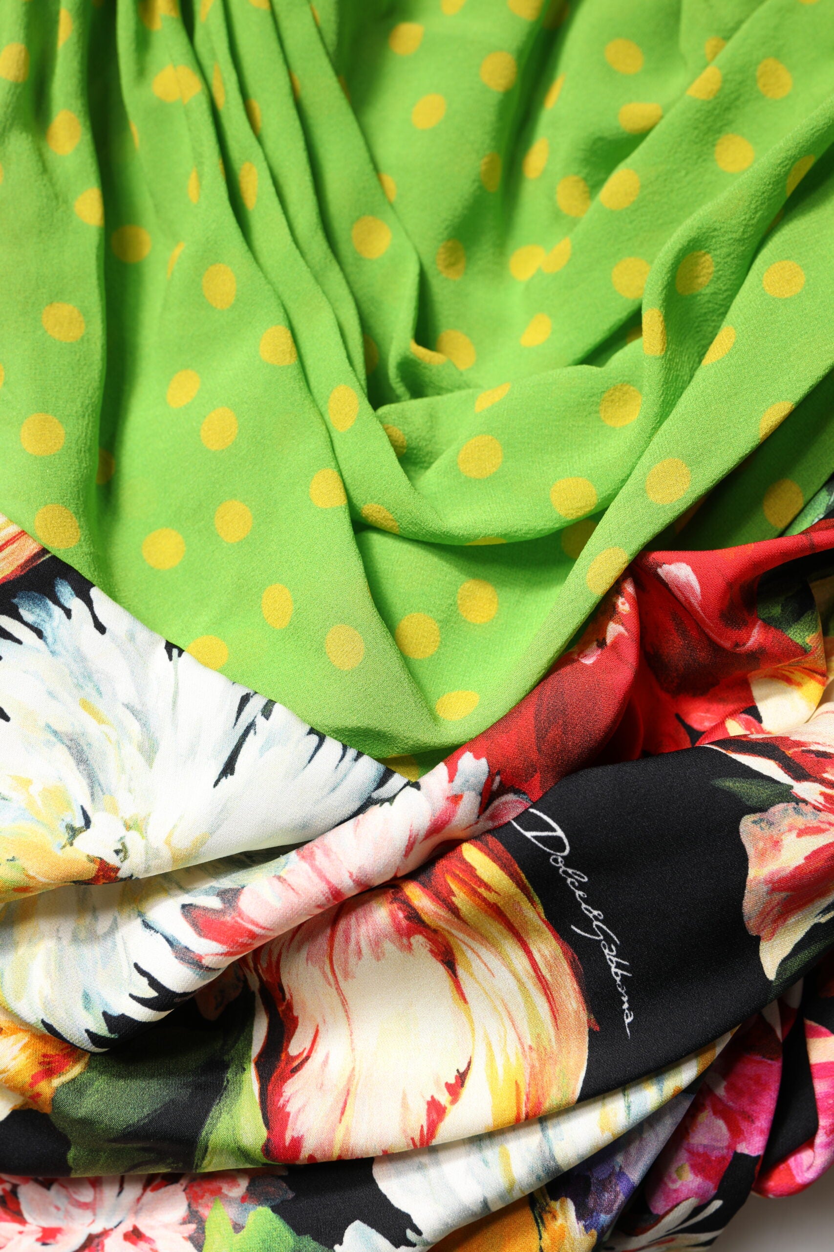 A colorful floral patterned mini dress with a fitted silhouette