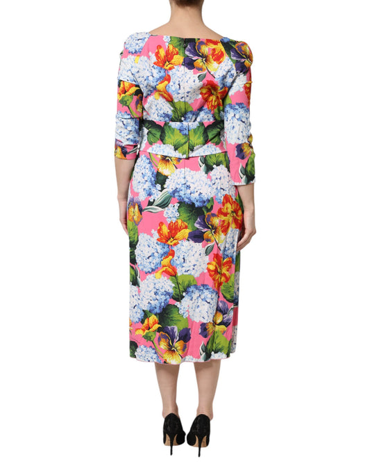 A midi dress with a floral pattern and pleats, designed by Dolce & Gabbana