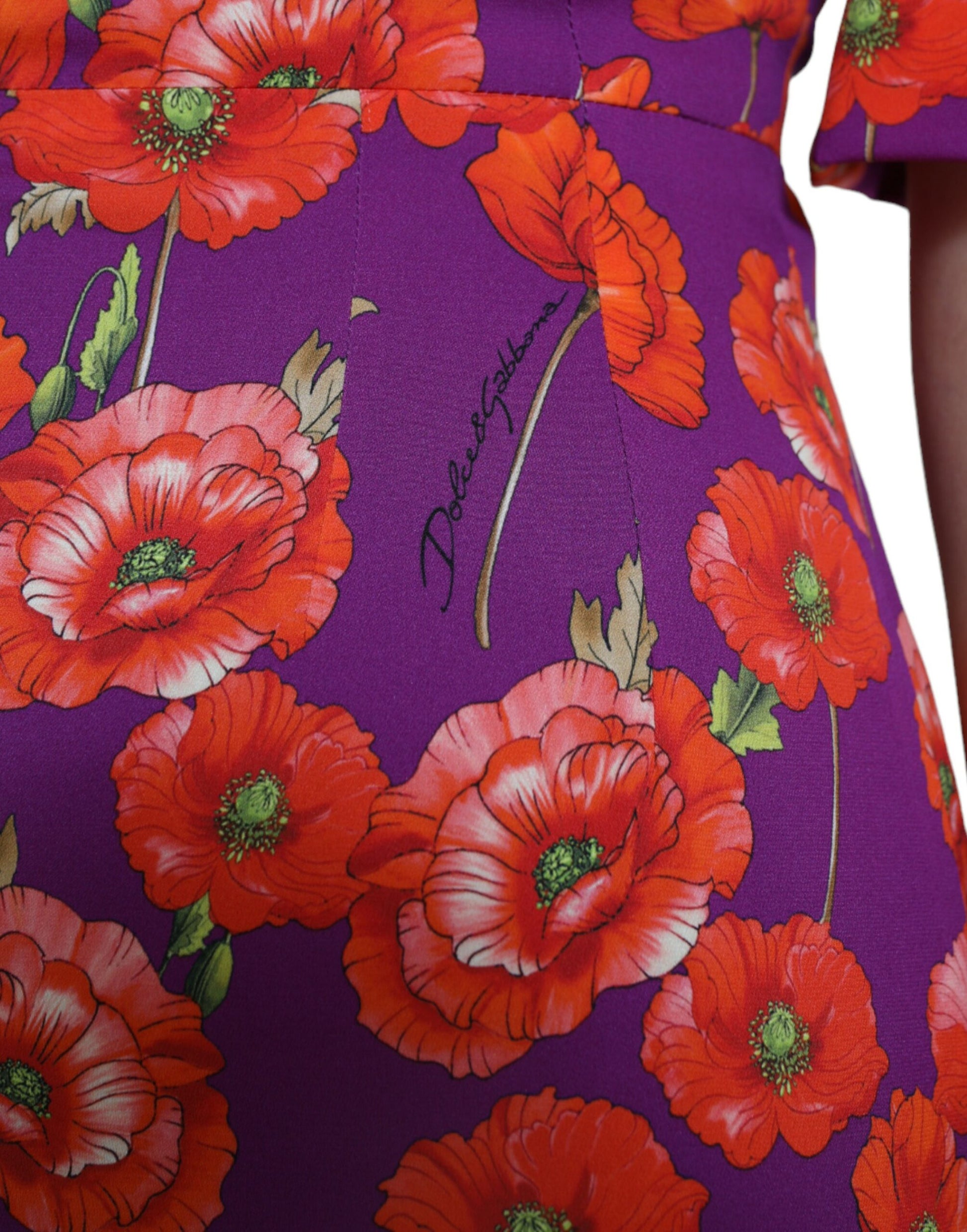 Purple dress with red poppies print, signed by designer