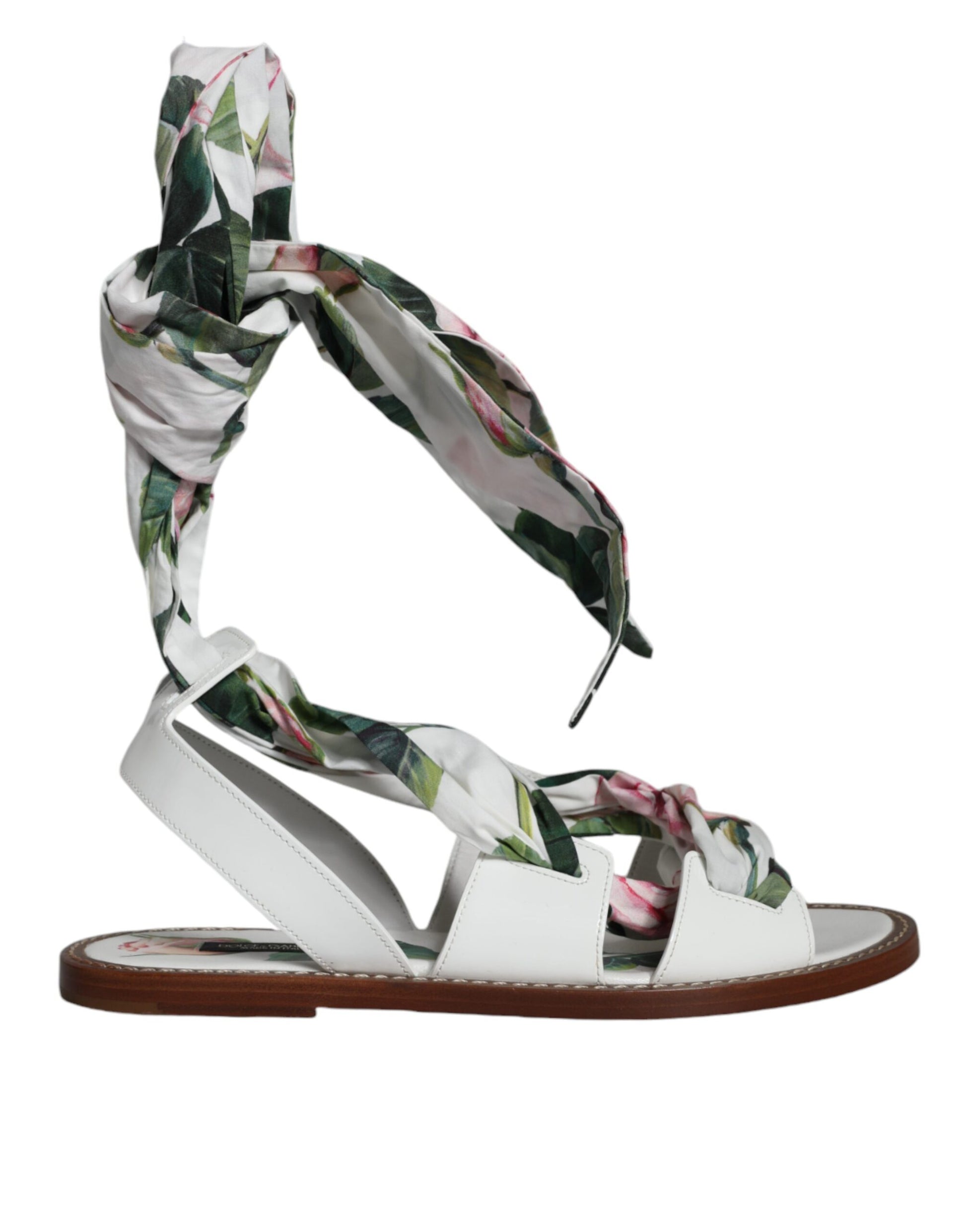 Pair of white sandals with floral patterned straps