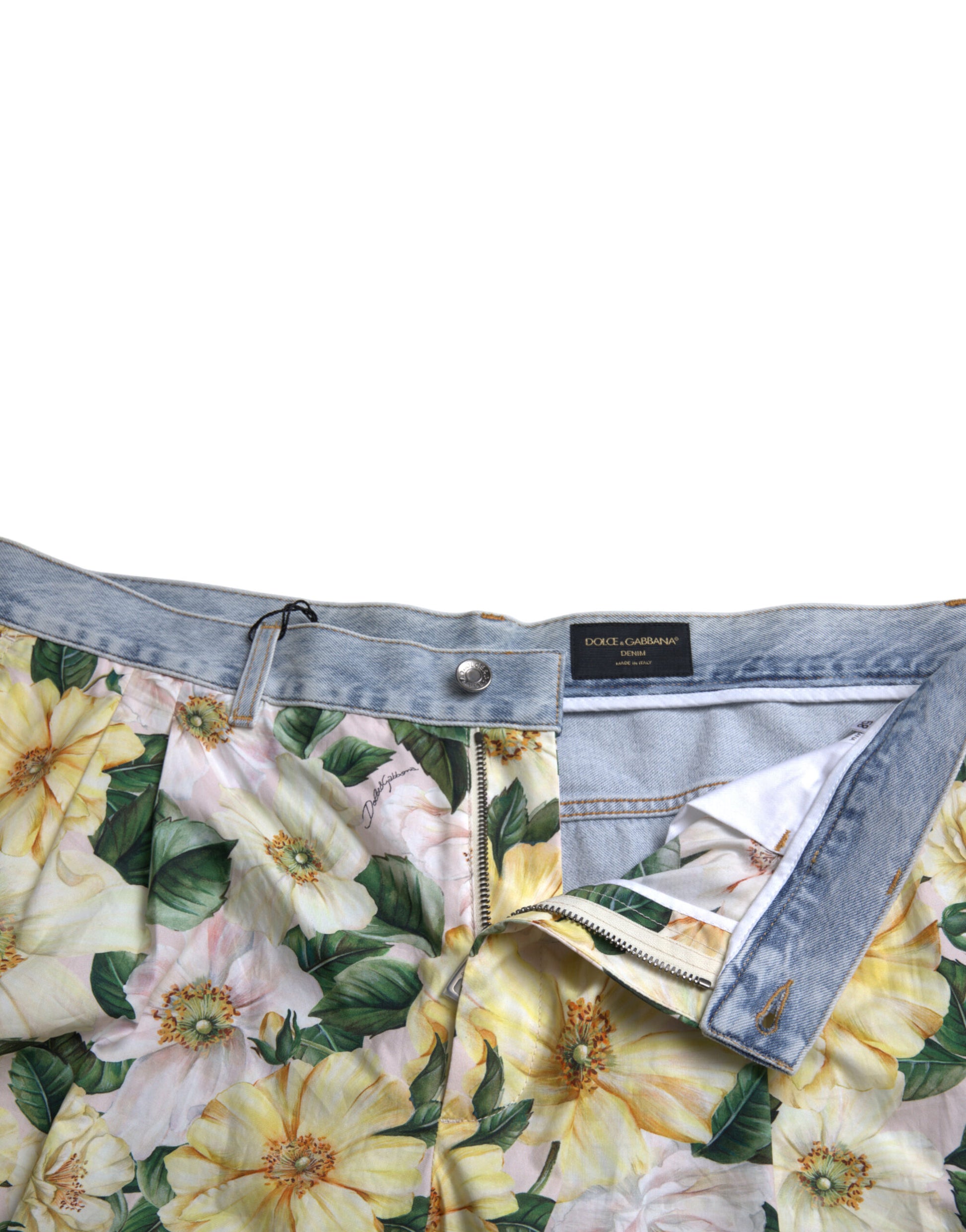 Blue denim jeans with floral pattern on waistband
