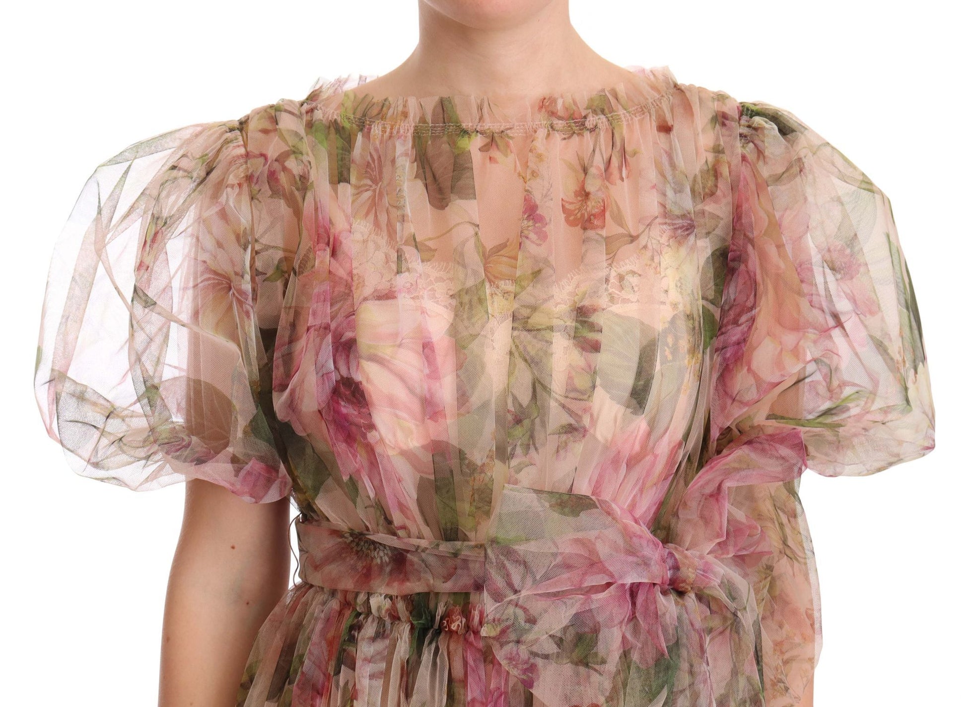 A long, multicolored floral print dress with puffy sleeves