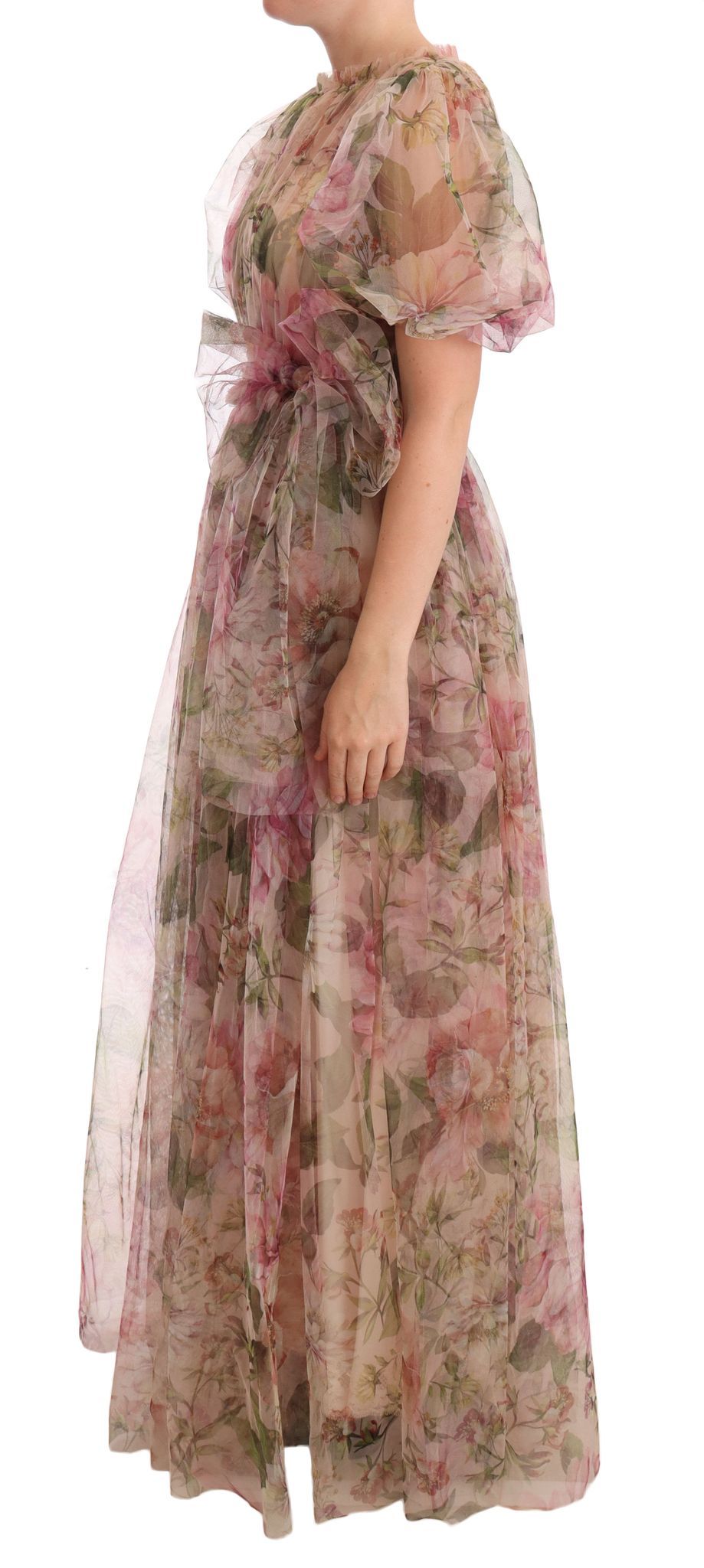 A long, flowing dress with a floral print and sheer overlay