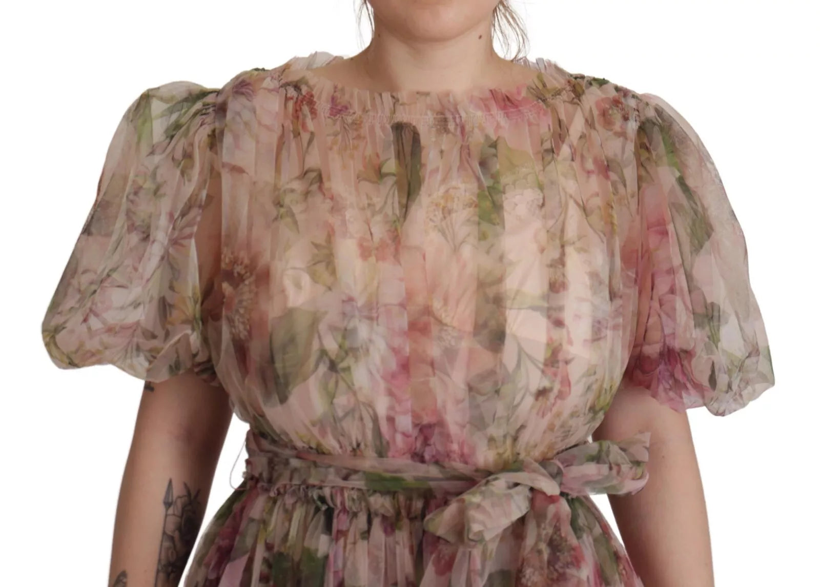 A long, floral print maxi dress with ruffled sleeves and a tie at the waist