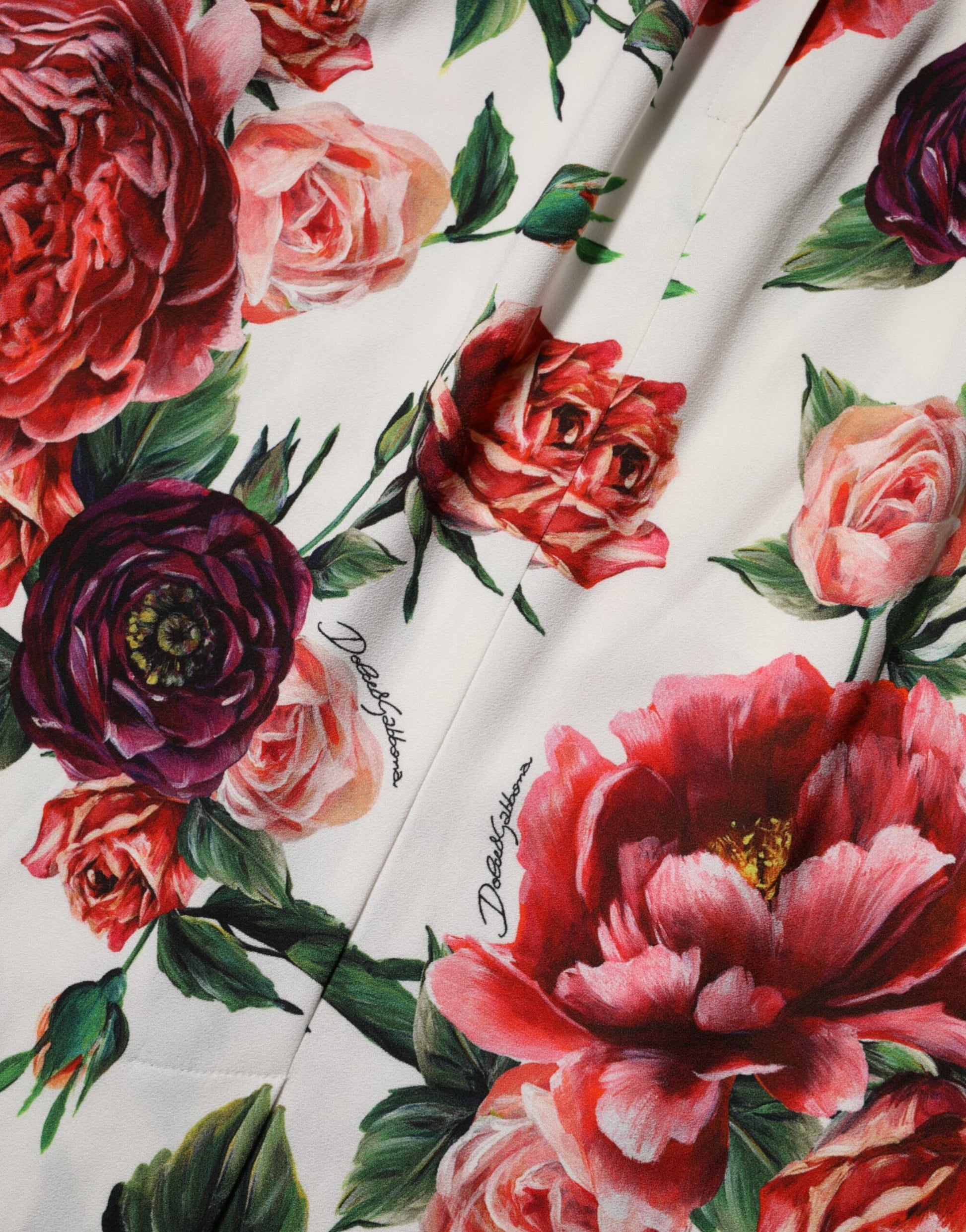 A floral print dress with roses on a viscose fabric